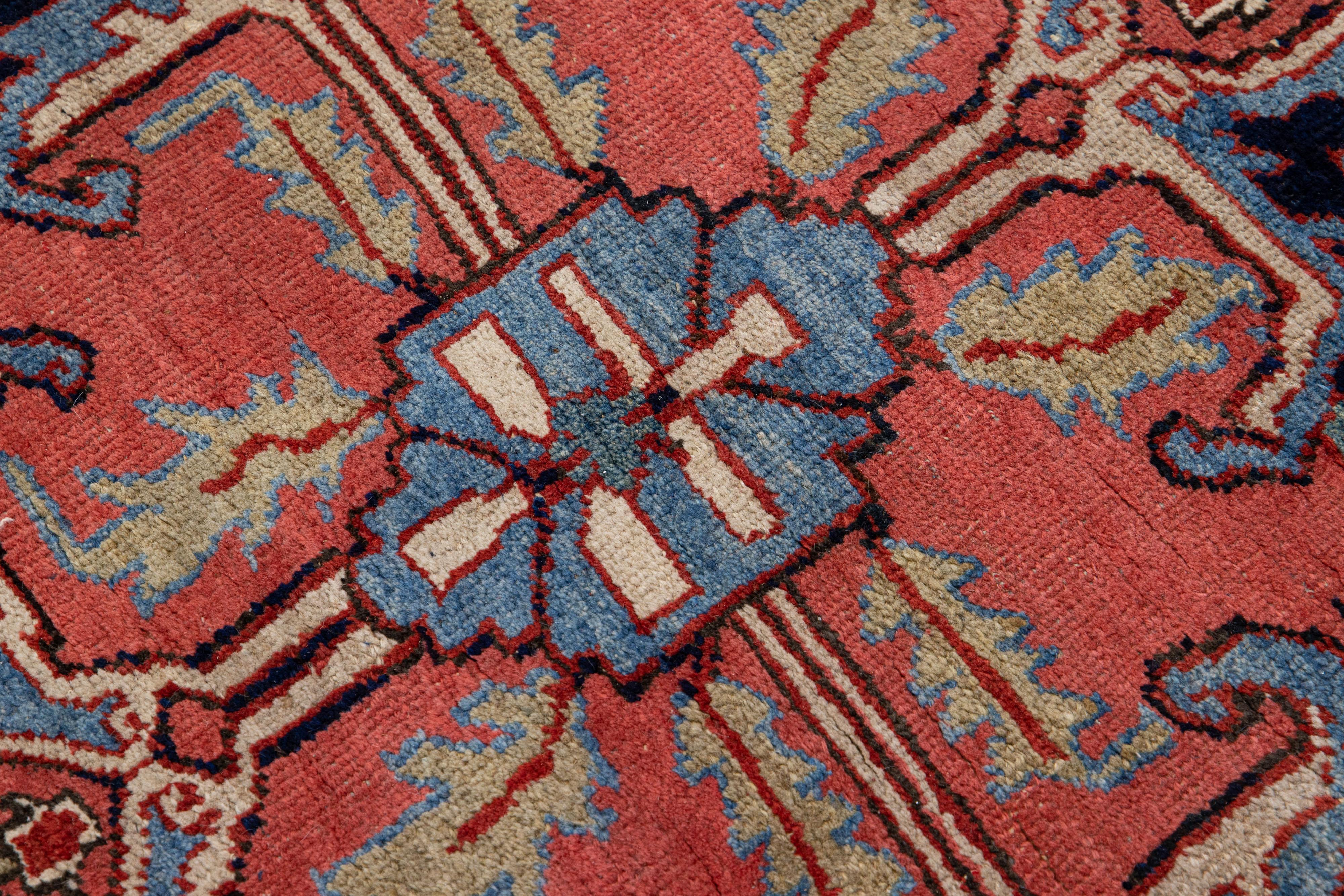 Antique Persian Heriz Handmade Red & Blue Wool Rug with Medallion Design For Sale 3