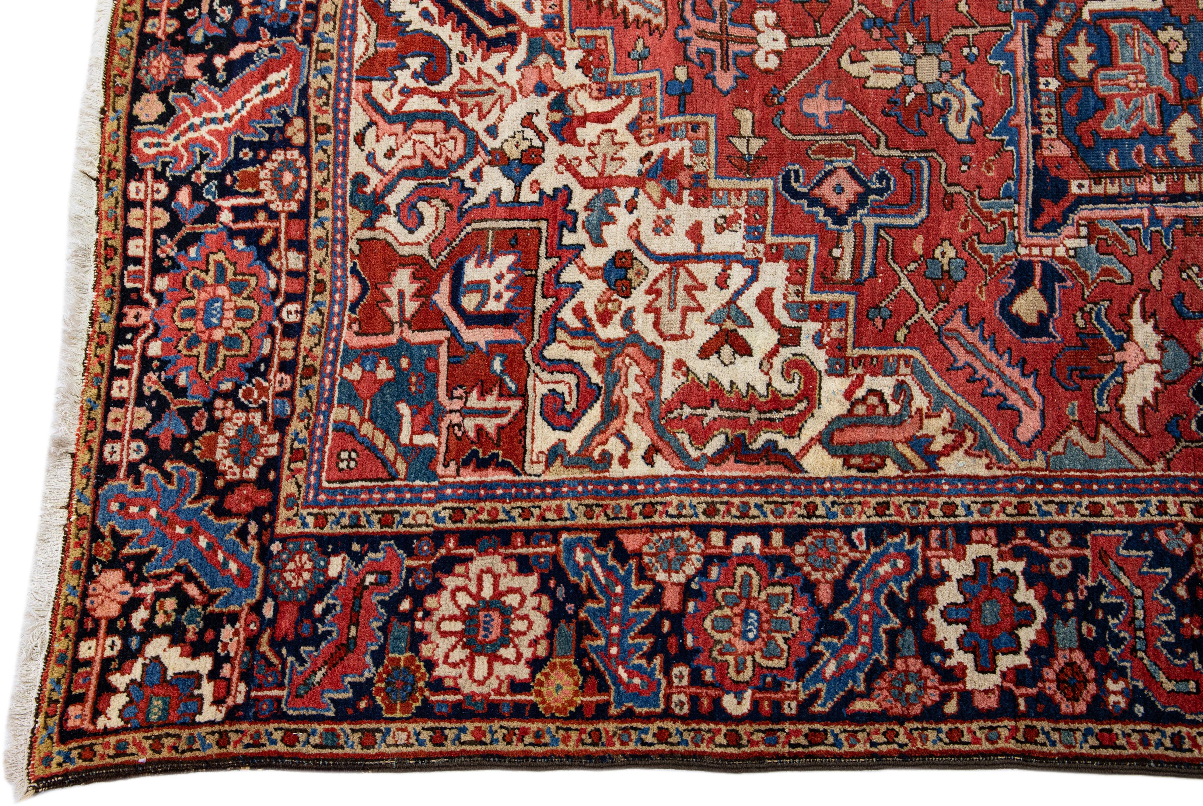 Hand-Knotted Antique Persian Heriz Handmade Red Wool Rug with Medallion Motif For Sale