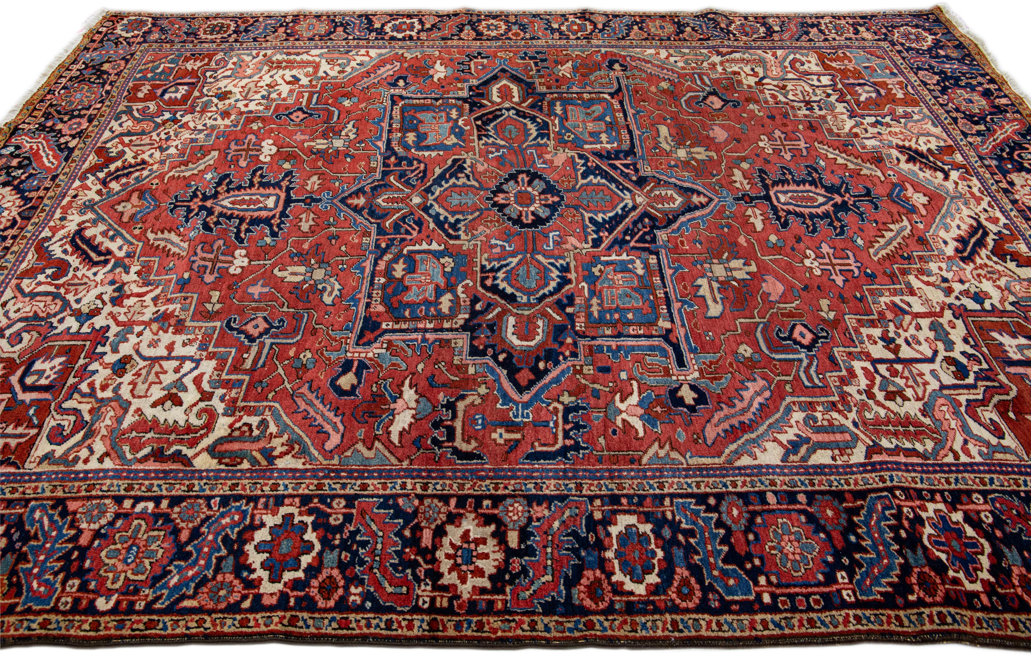 Antique Persian Heriz Handmade Red Wool Rug with Medallion Motif In Good Condition For Sale In Norwalk, CT