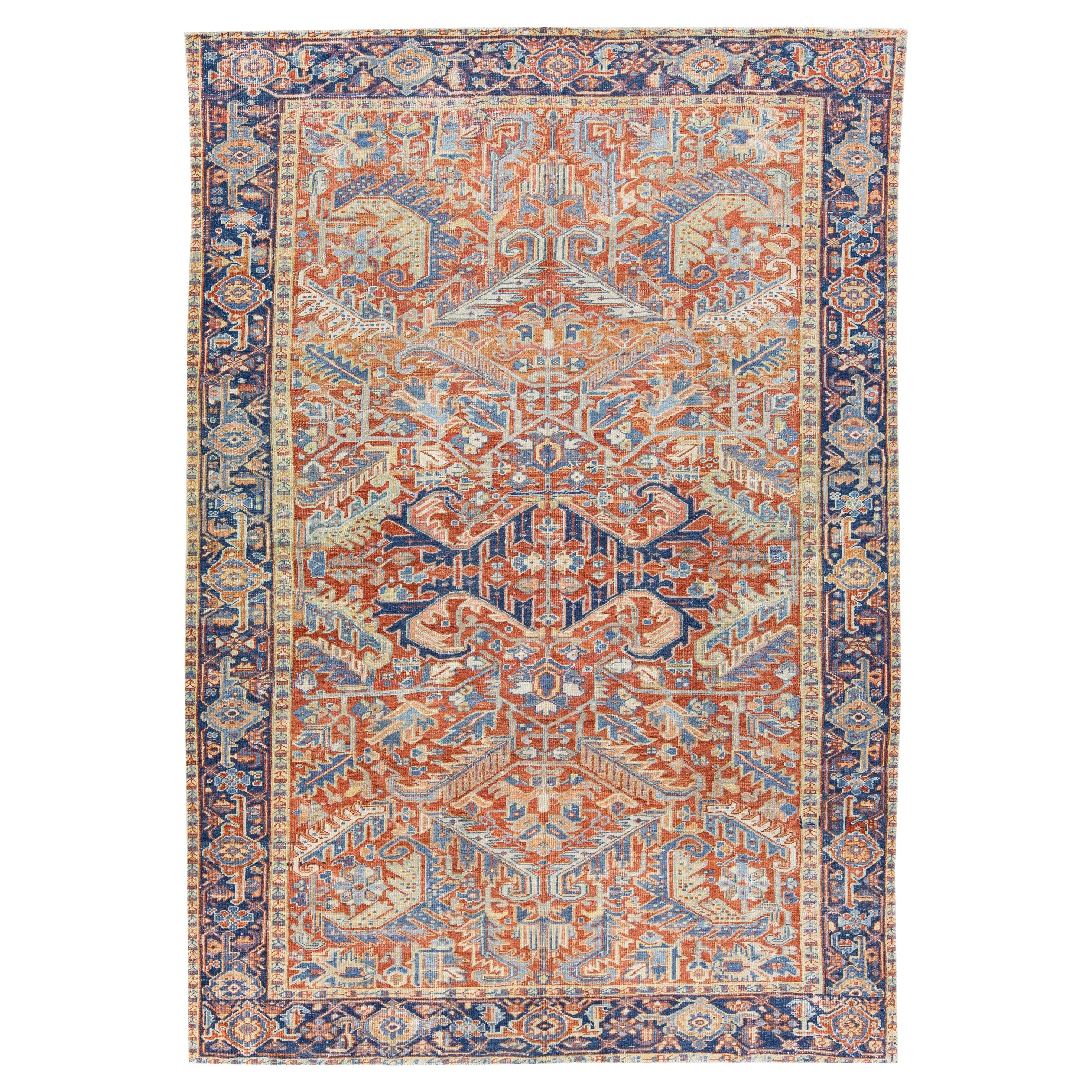 Tapis persan ancien Heriz en laine rouille fait à la main avec tout un design