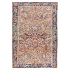 Tapis persan ancien Heriz en laine rouille fait à la main avec tout un design