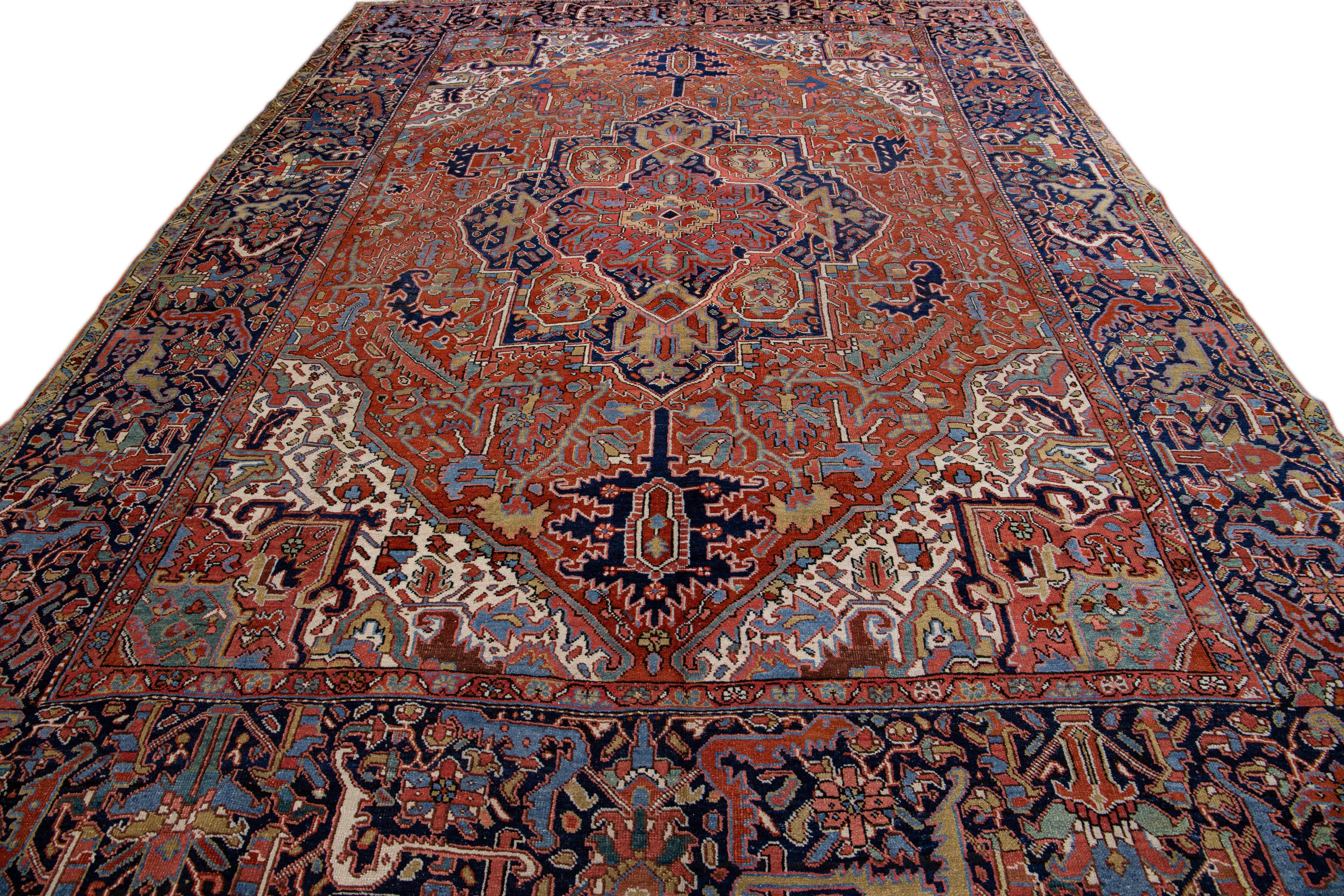 Heriz Serapi  Antique Persian Heriz Handmade Rust Wool Rug with Medallion Design For Sale