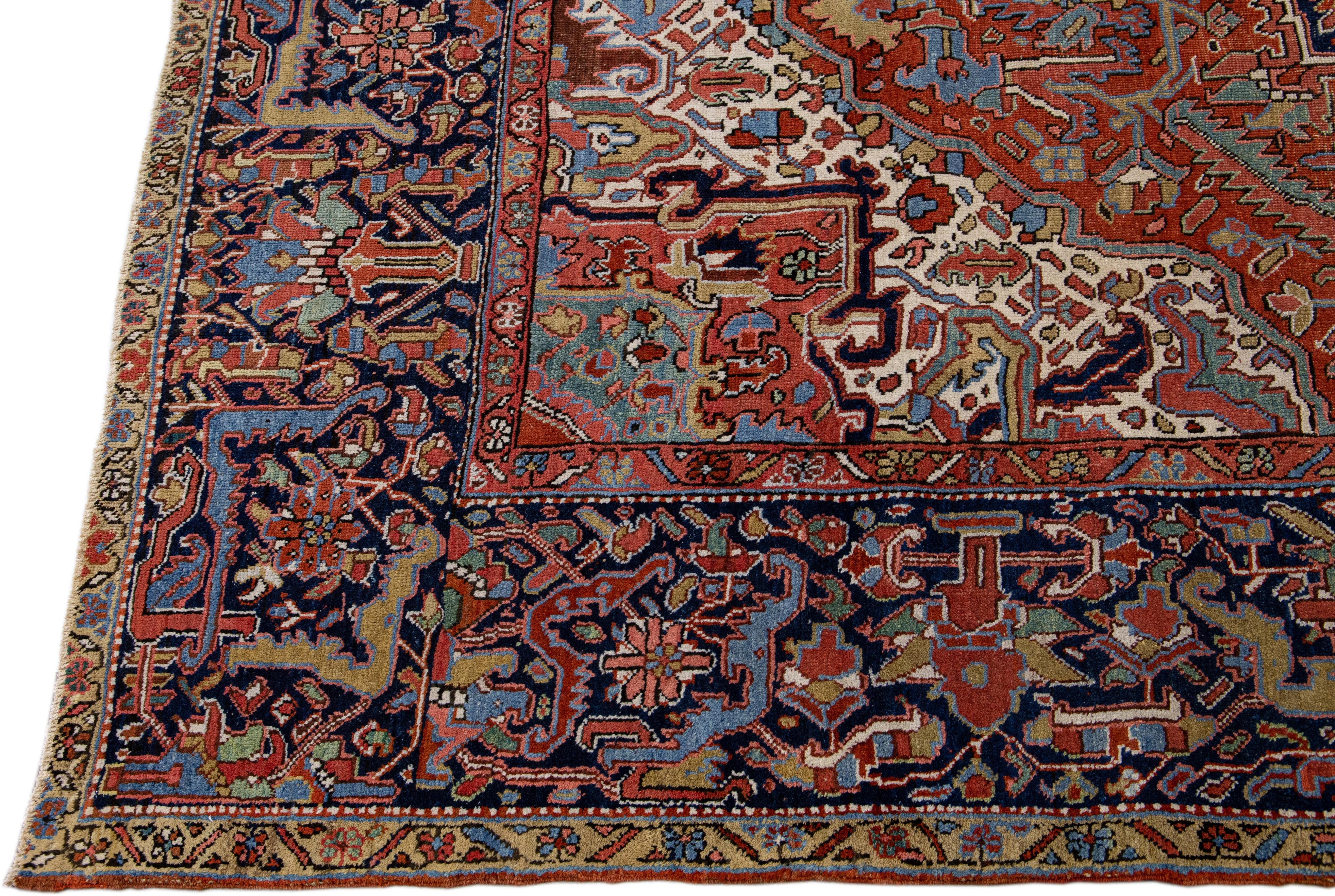 Hand-Knotted  Antique Persian Heriz Handmade Rust Wool Rug with Medallion Design For Sale