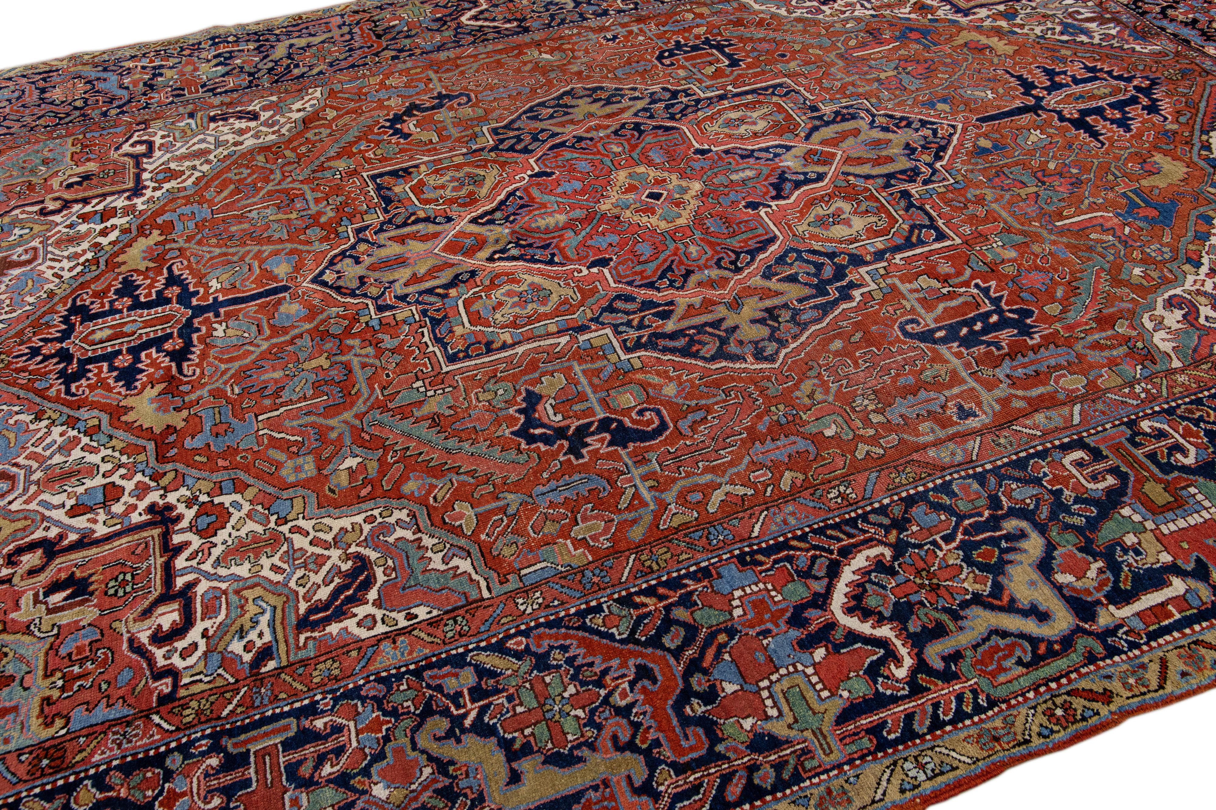 Antique Persian Heriz Handmade Rust Wool Rug with Medallion Design In Good Condition For Sale In Norwalk, CT