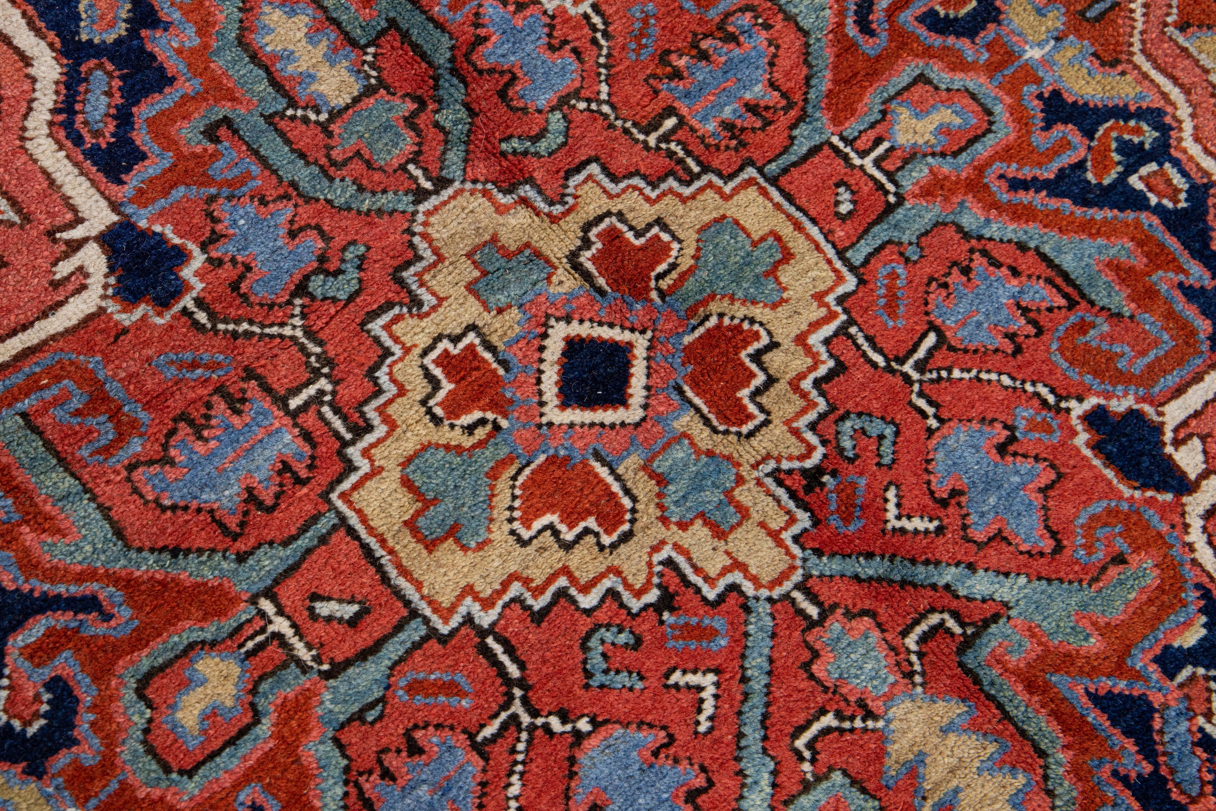  Antique Persian Heriz Handmade Rust Wool Rug with Medallion Design For Sale 1