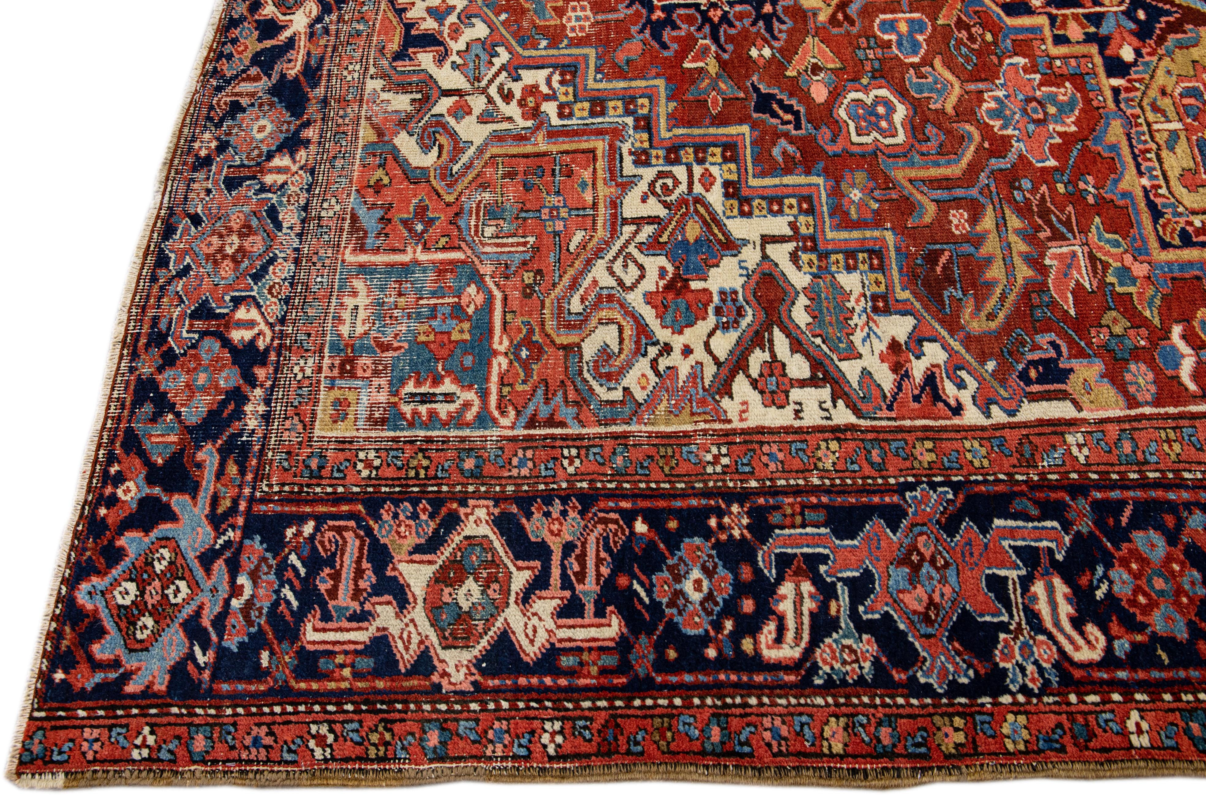 Hand-Knotted Antique Persian Heriz Handmade Wool Rug with Multicolor Medallion Design For Sale