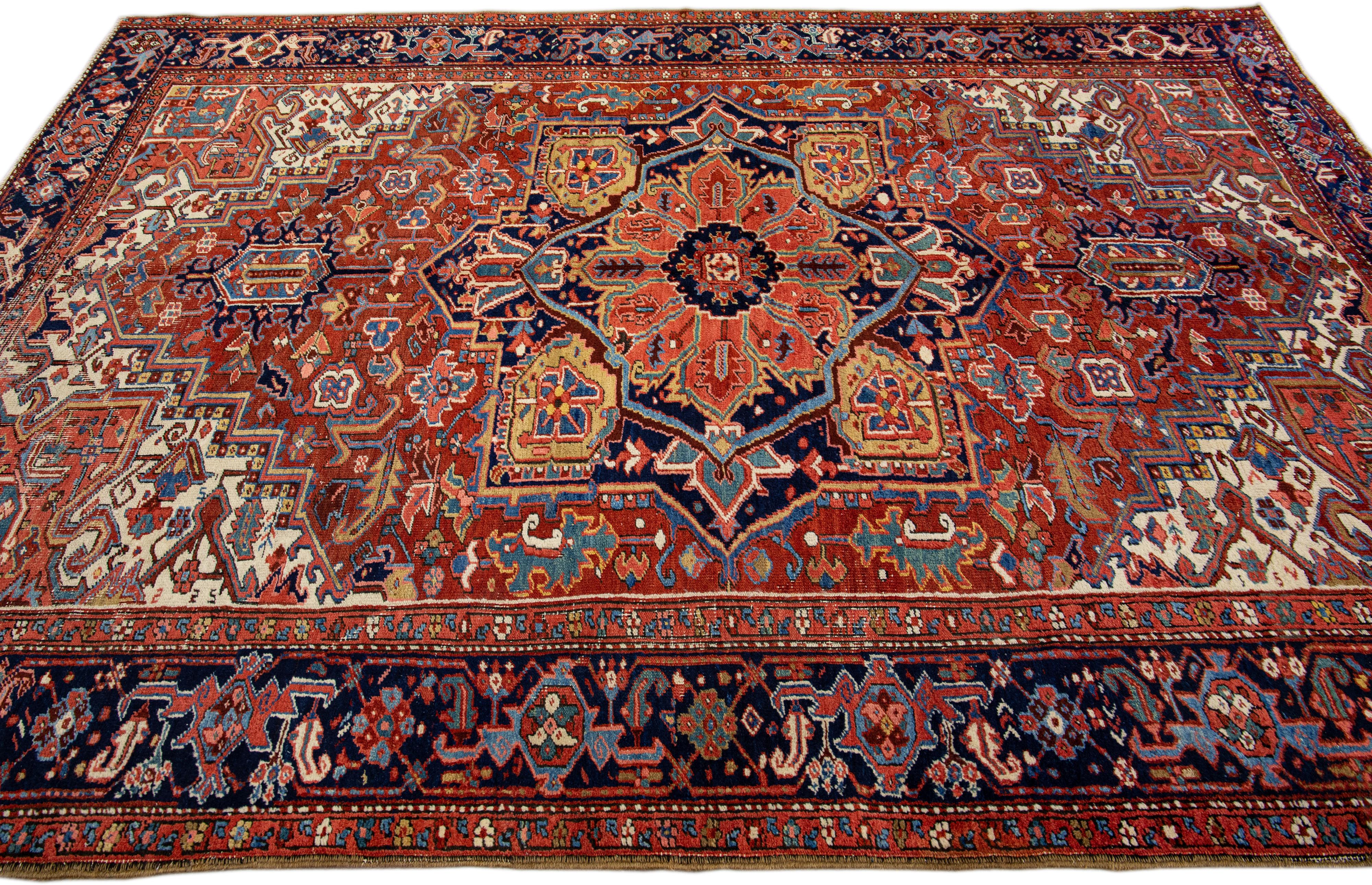 Antique Persian Heriz Handmade Wool Rug with Multicolor Medallion Design In Good Condition For Sale In Norwalk, CT