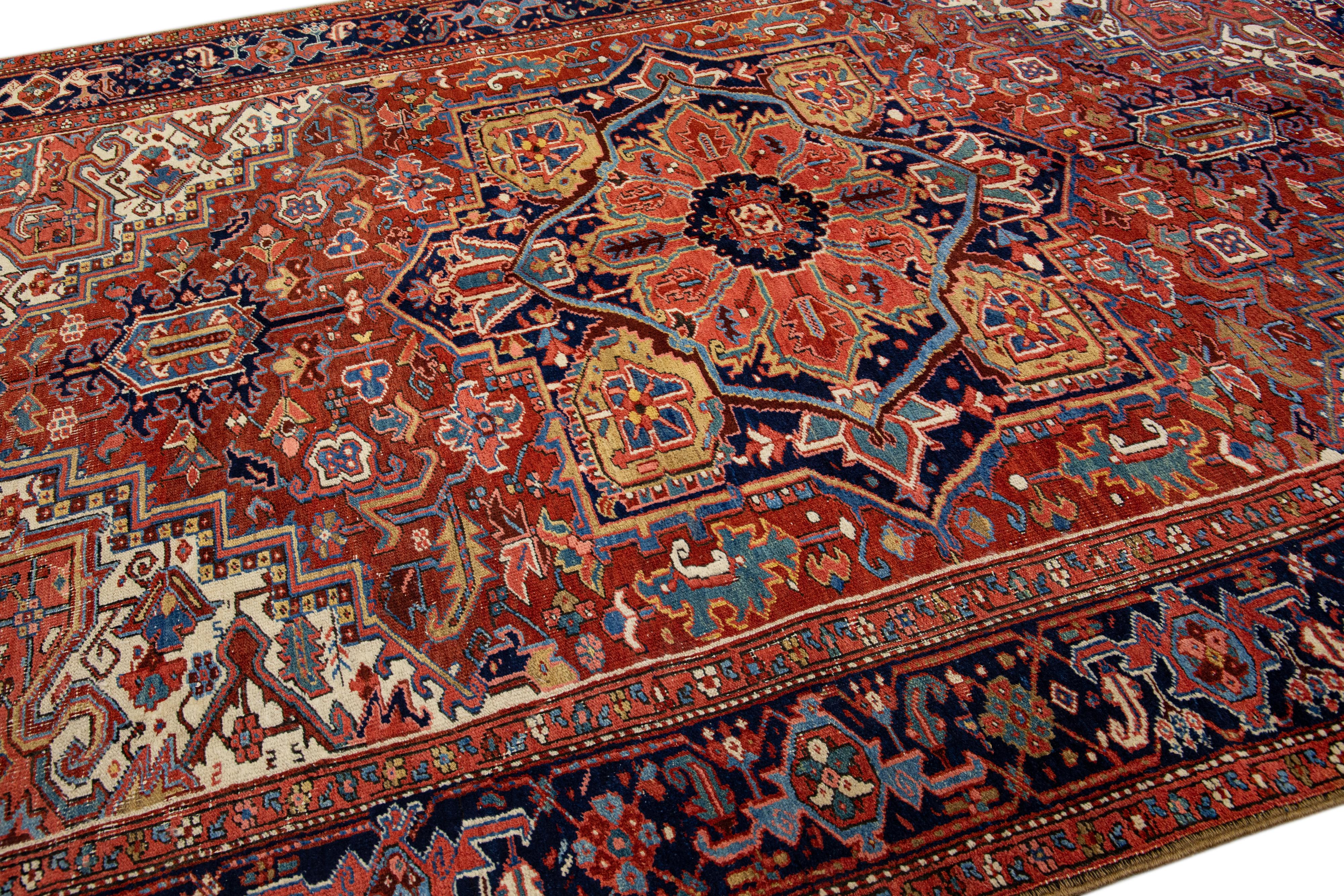 Antique Persian Heriz Handmade Wool Rug with Multicolor Medallion Design For Sale 2