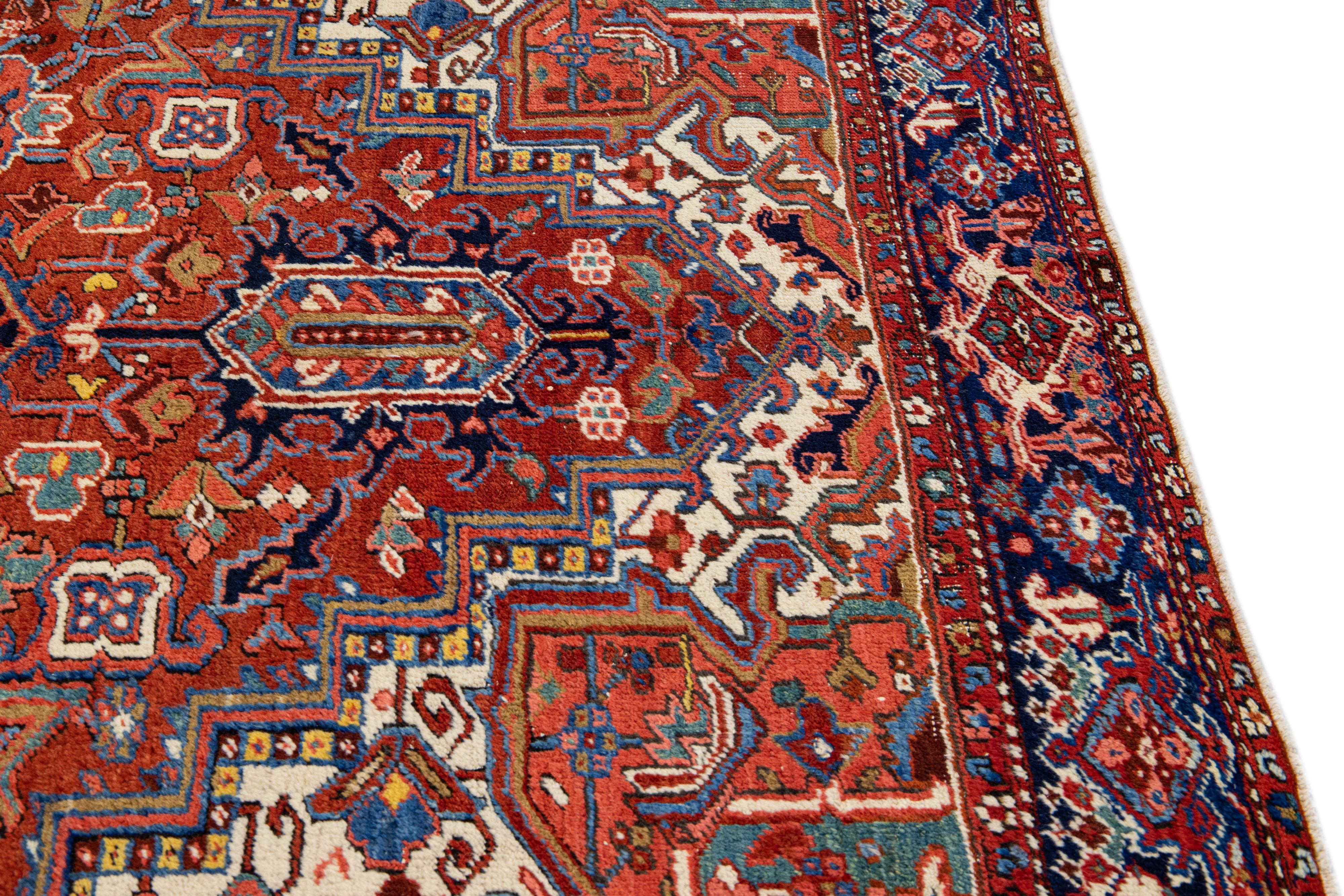 Antique Persian Heriz Handmade Wool Rug with Multicolor Medallion Design For Sale 3