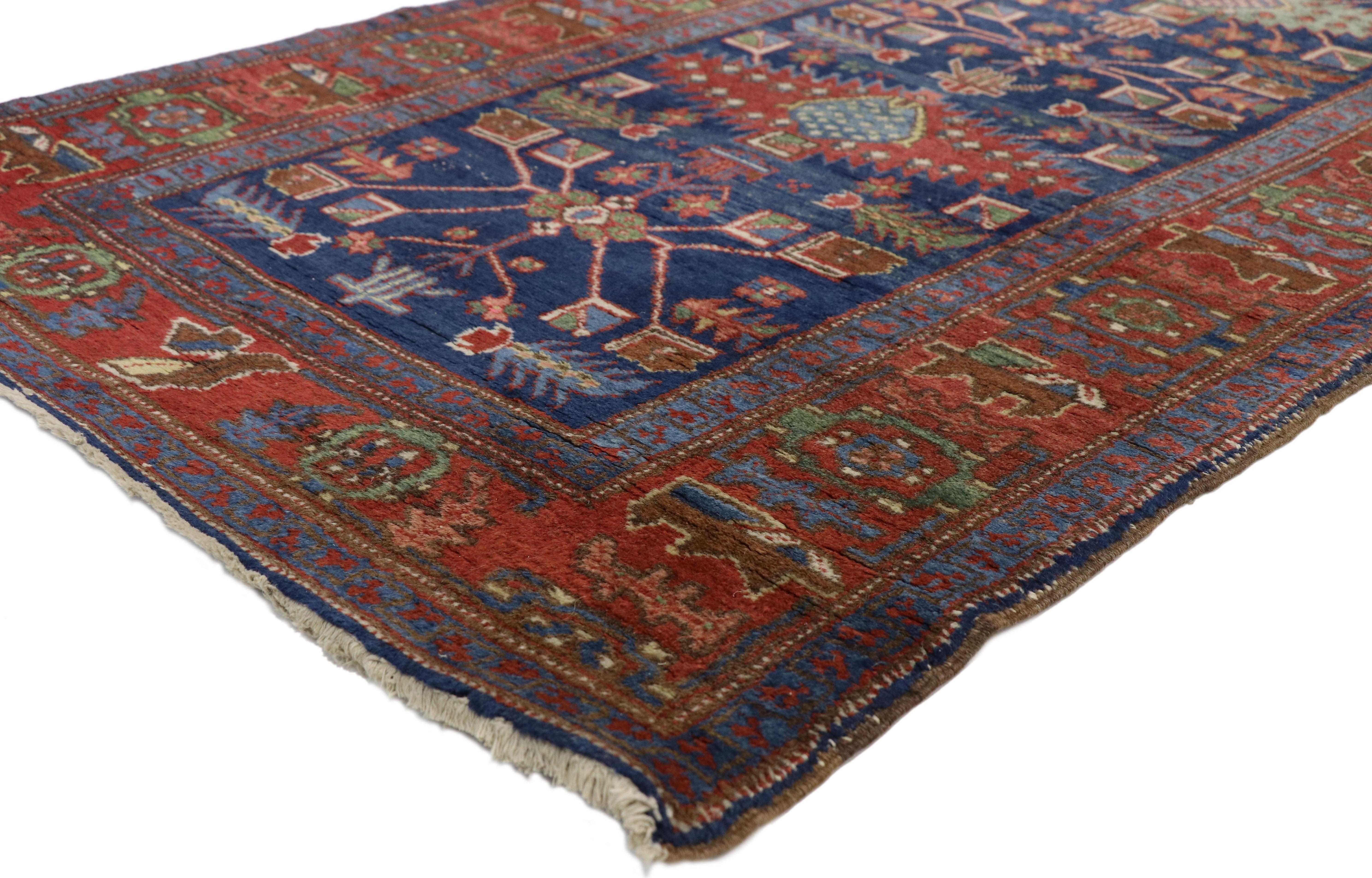 77053 Antique Persian Heriz Karaja Runner with Modern Art Deco Tribal Style, Extra-Long Hallway Runner 03'03 x 17'03. This hand knotted wool antique Persian Karaja Heriz runner features a column of distinctive medallions and amulets similar to those