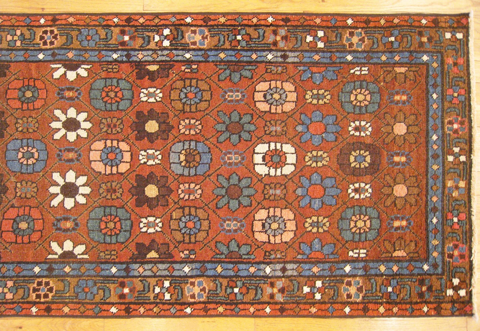 Hand-Knotted Antique Persian Heriz Oriental Rug, in Runner size, Repeating Flower Head Design For Sale