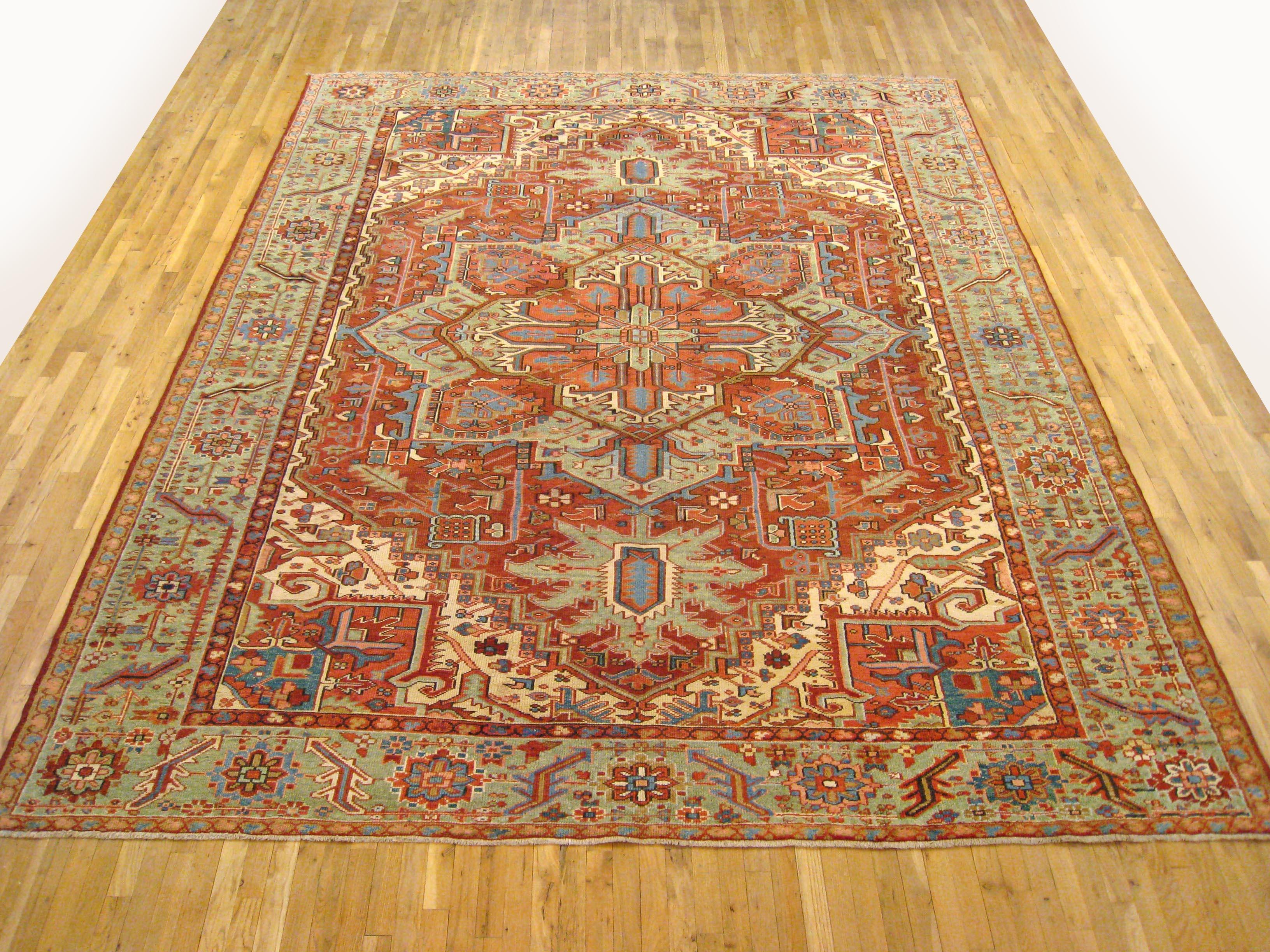 Antique Persian Heriz oriental rug, room size

An antique Persian Heriz oriental rug, size 12'7
