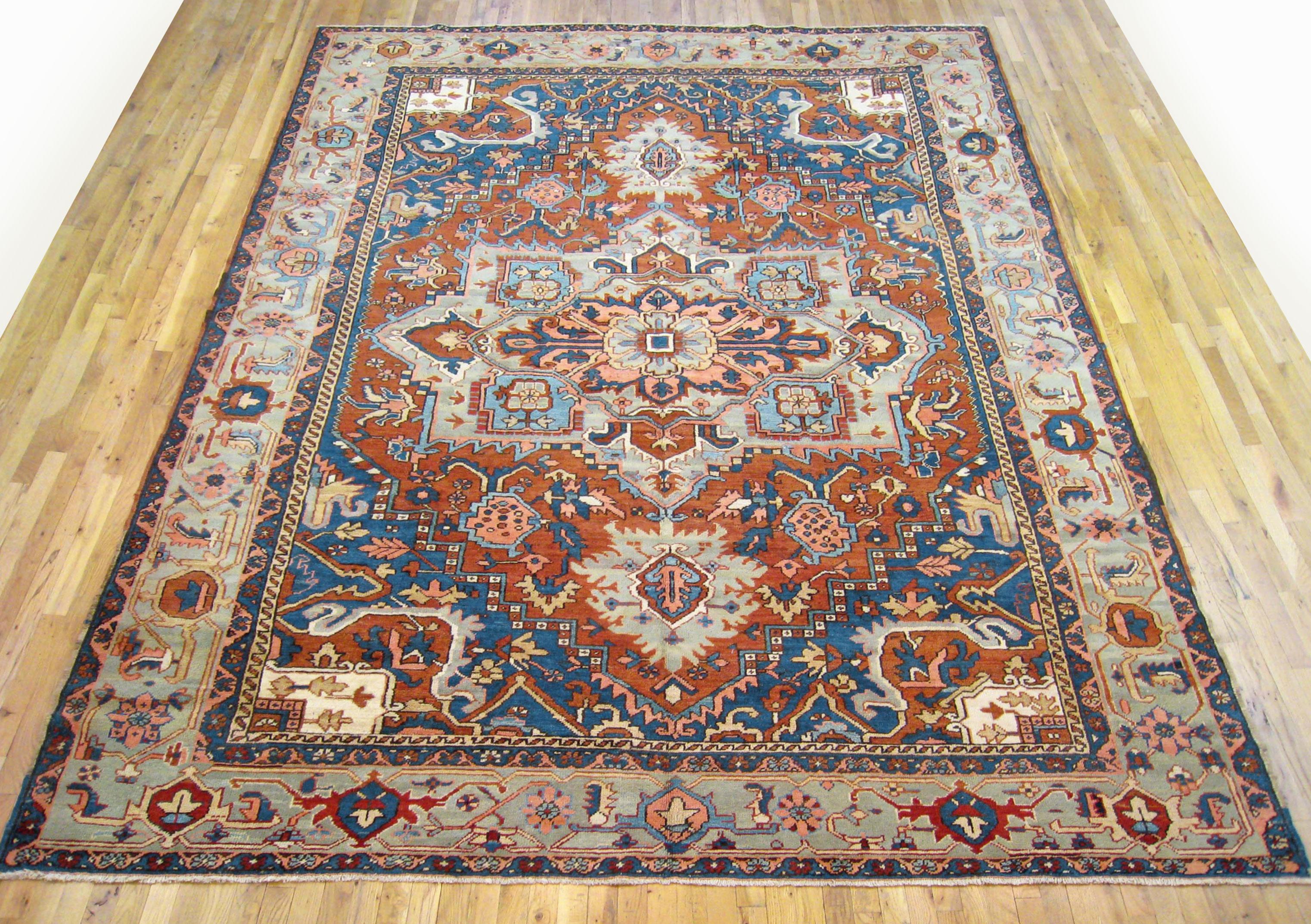 Antique Persian Heriz oriental rug, room size

An antique Persian Heriz oriental rug, size 12'4