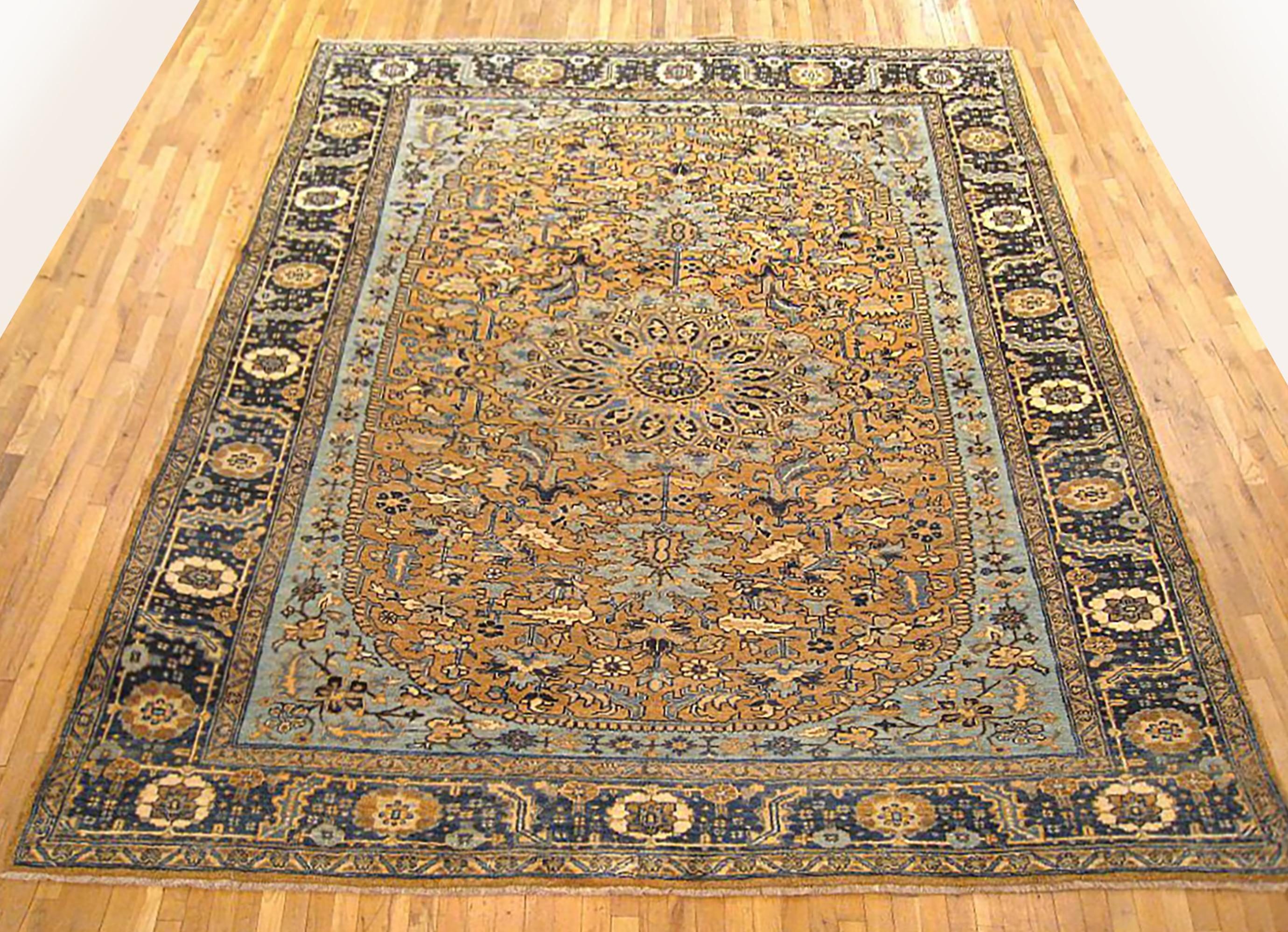 Vintage Persian Heriz Oriental rug, room size

A vintage Persian Heriz oriental rug, size 12'1