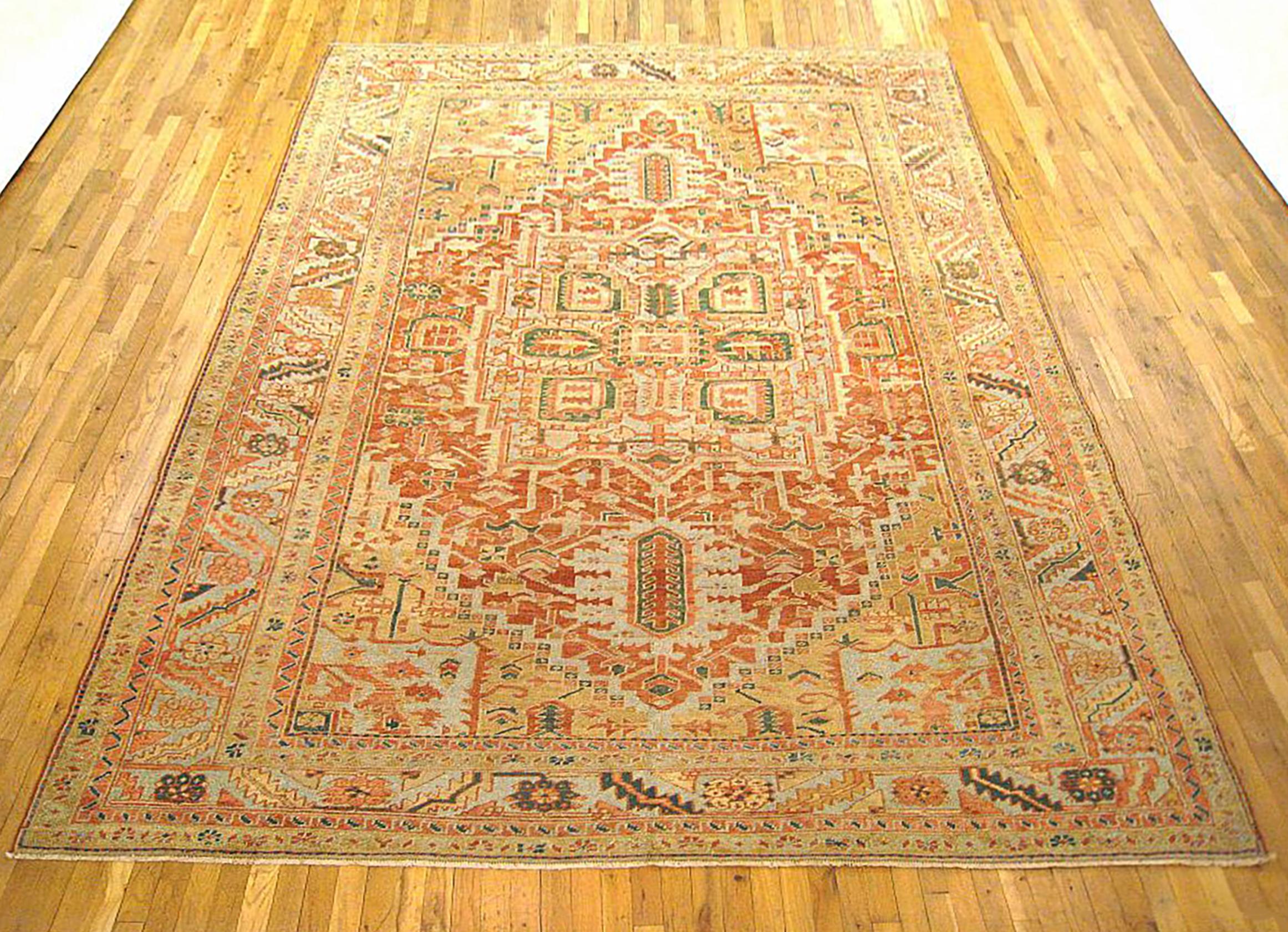 Antique Persian Heriz oriental rug, room size

An antique Persian Heriz oriental rug, size 11'3