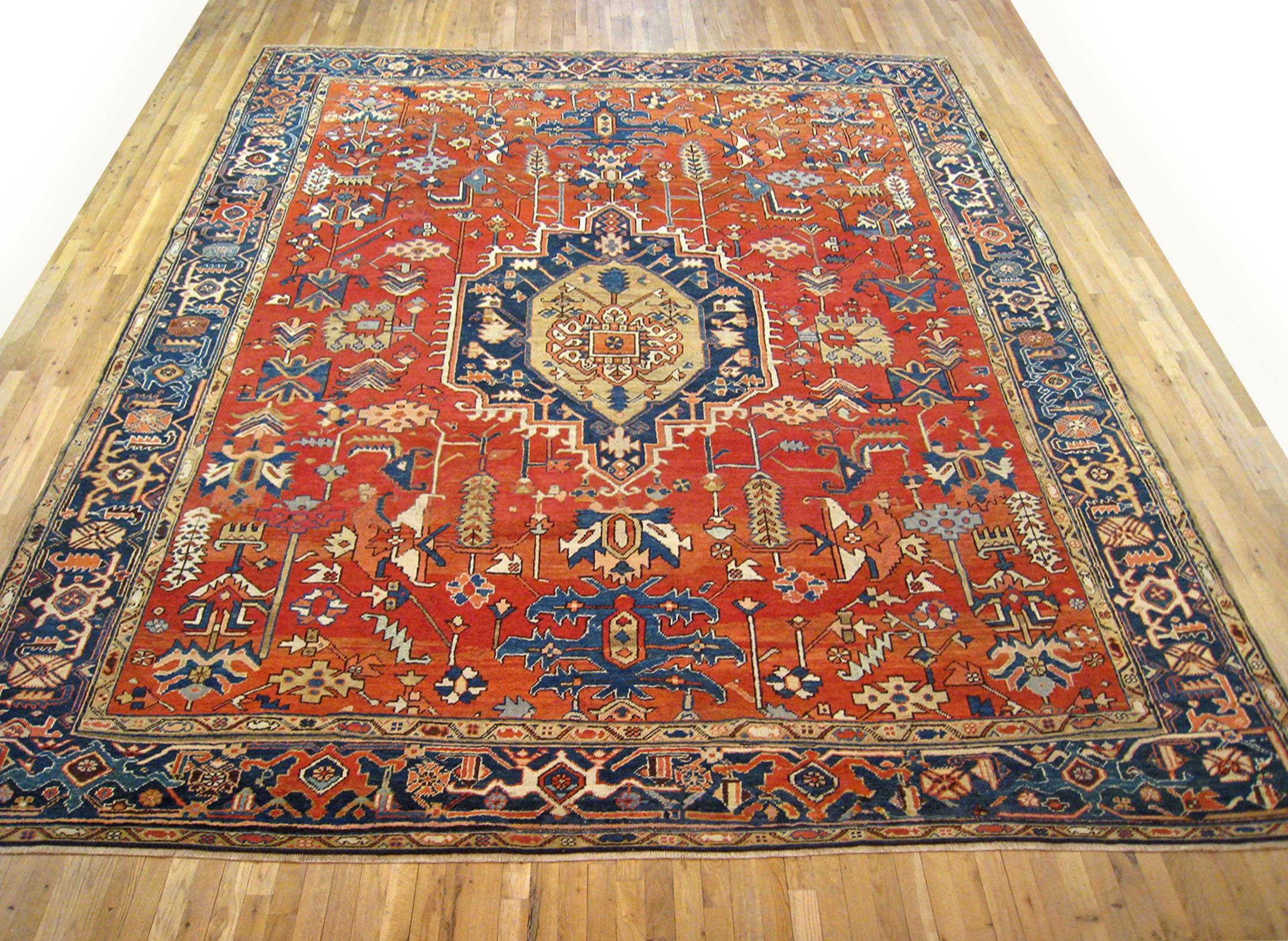 Antique Persian Heriz Oriental rug, Room size

An antique Persian Heriz oriental rug, size 12'1