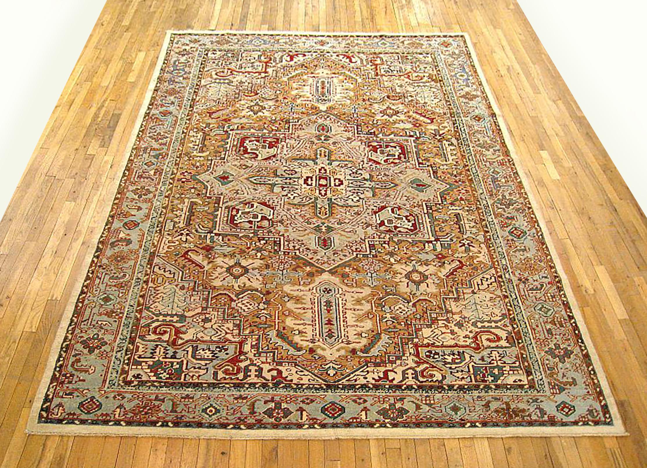 Antique Persian Heriz Oriental rug, Room size

An antique Persian Heriz oriental rug, size 11'3