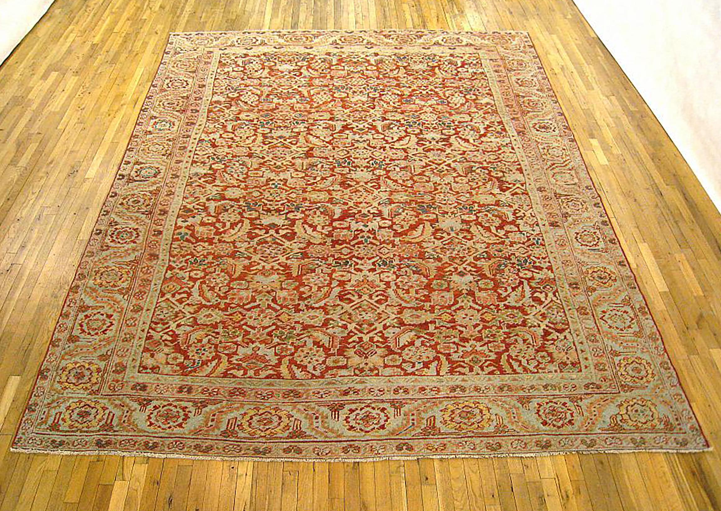 Antique Persian Heriz Oriental rug, Room size

An antique Persian Heriz oriental rug, size 12'6