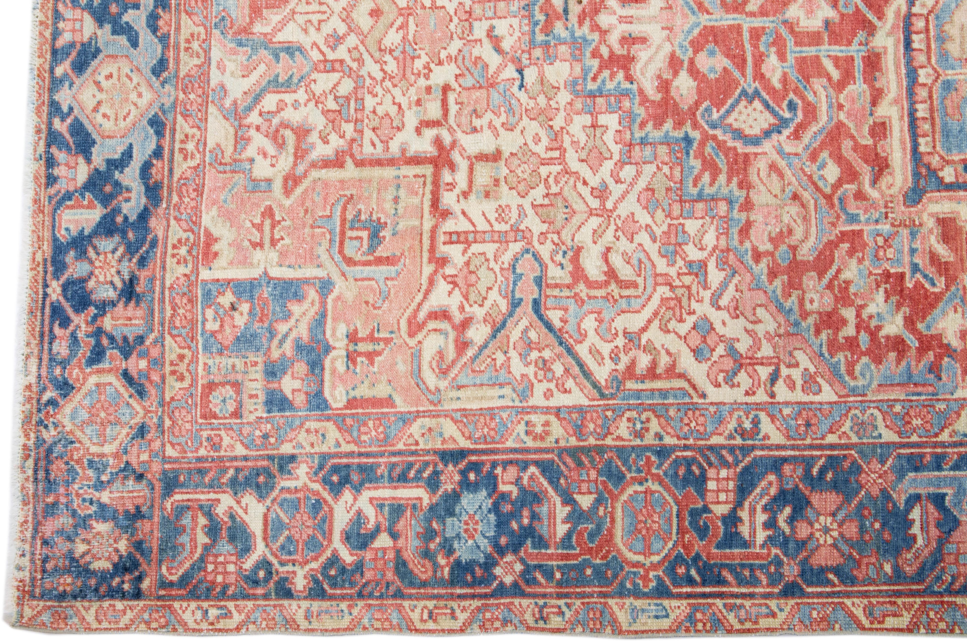 Heriz Serapi Antique Persian Heriz Pink Handmade Room Size Wool Rug with Medallion Design For Sale