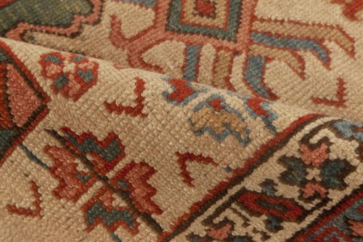 Antique Persian Heriz red, blue, green, pink, beige handmade wool rug by Doris Leslie Blau
Size: 8'9