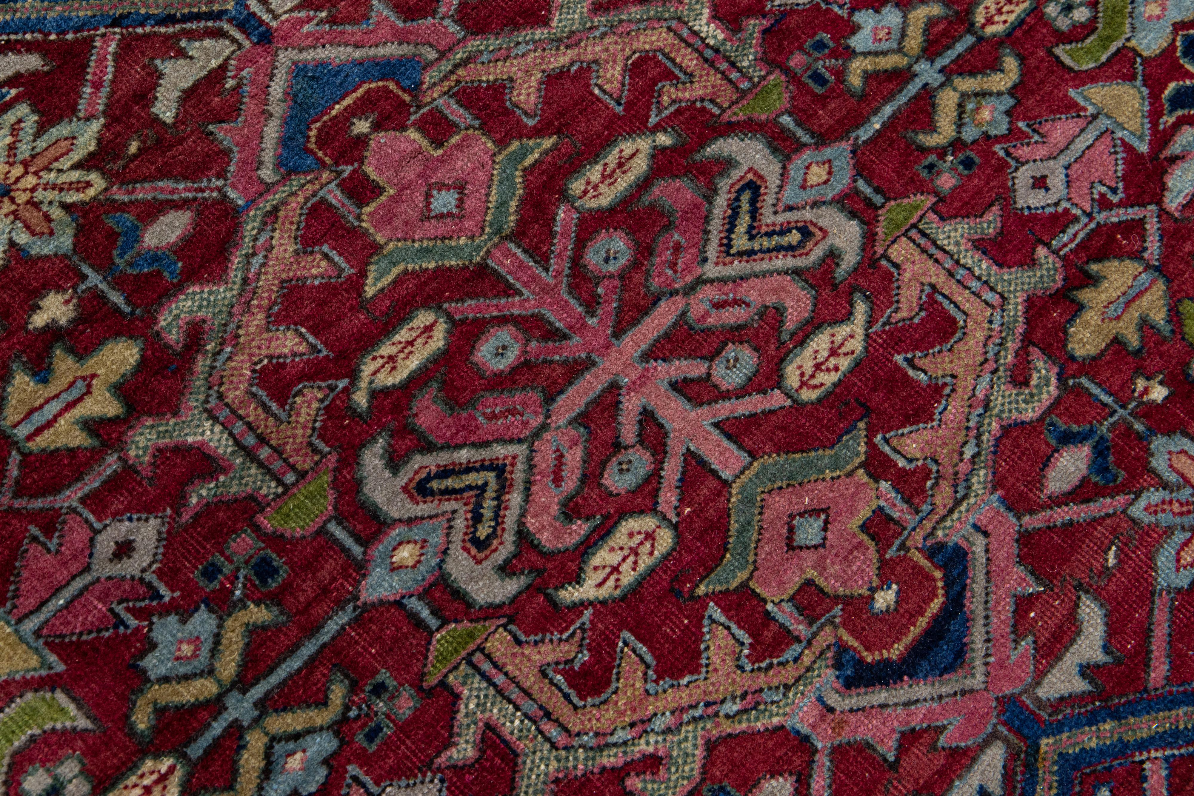 20th Century Antique Persian Heriz Red Handamade Allover Floral Wool Rug For Sale