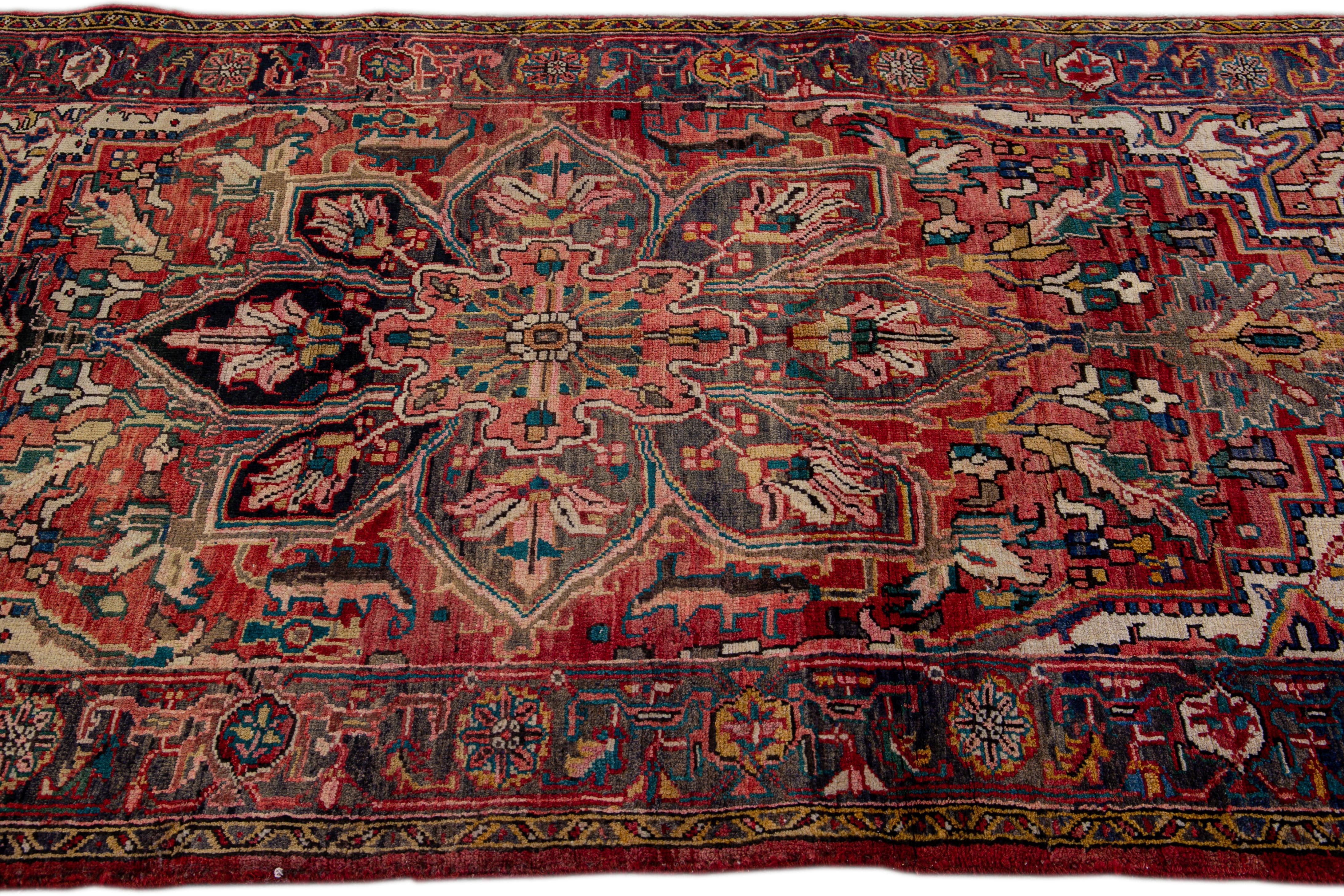 Early 20th Century Antique Persian Heriz Red Handmade Medallion Floral Wool Rug For Sale