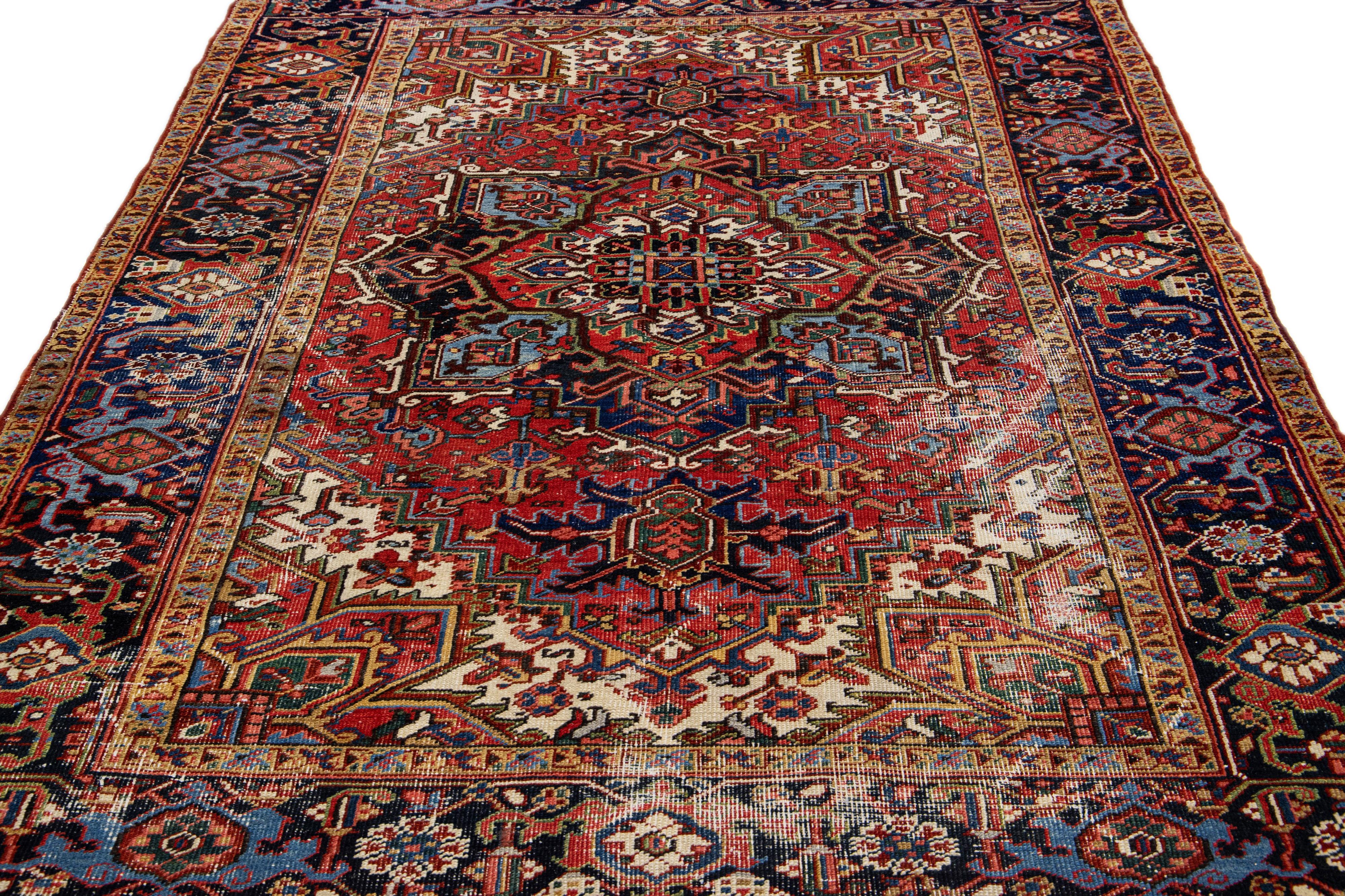 Heriz Serapi Antique Persian Heriz Red Handmade Medallion Motif Wool Rug For Sale