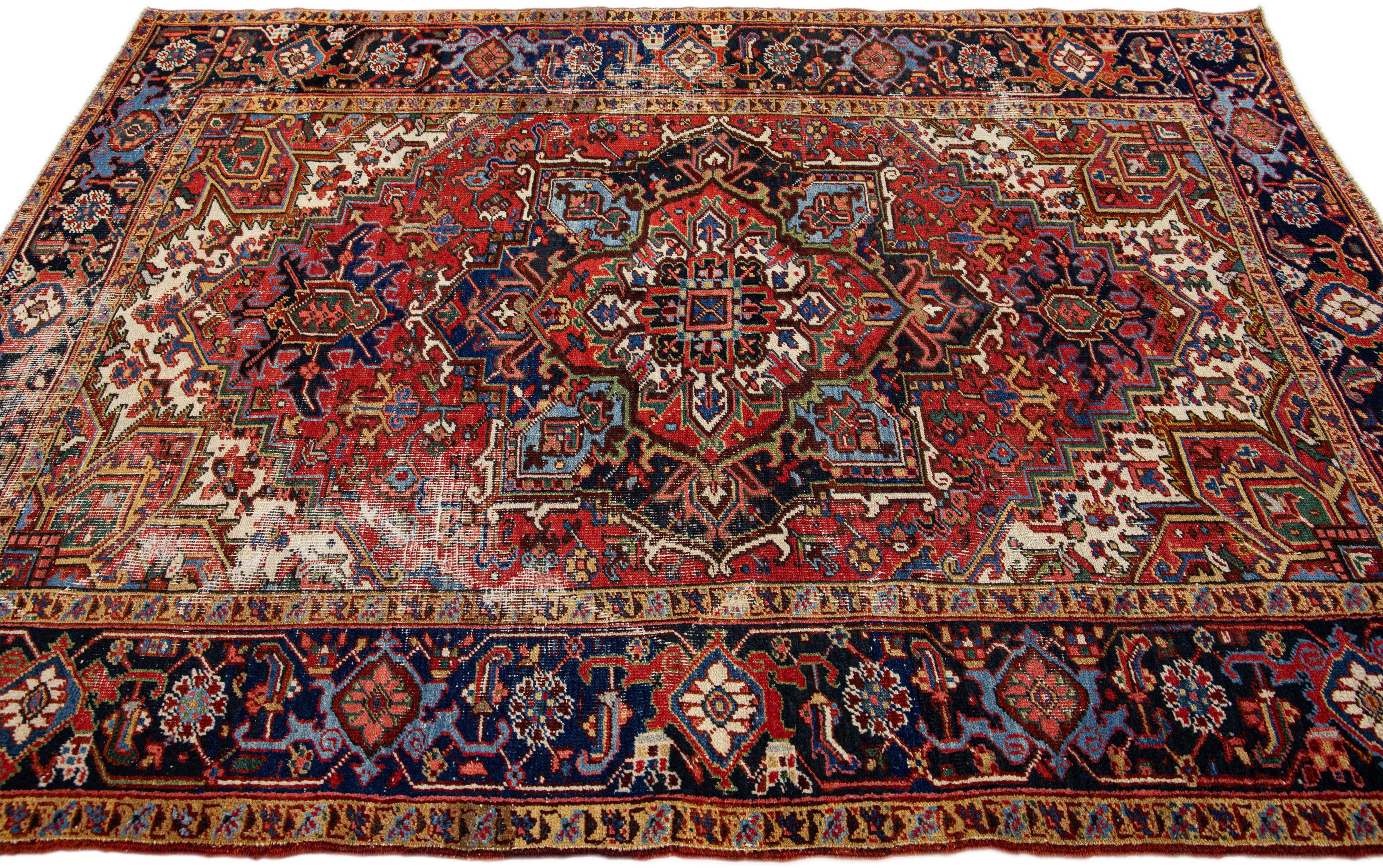 Antique Persian Heriz Red Handmade Medallion Motif Wool Rug In Distressed Condition For Sale In Norwalk, CT