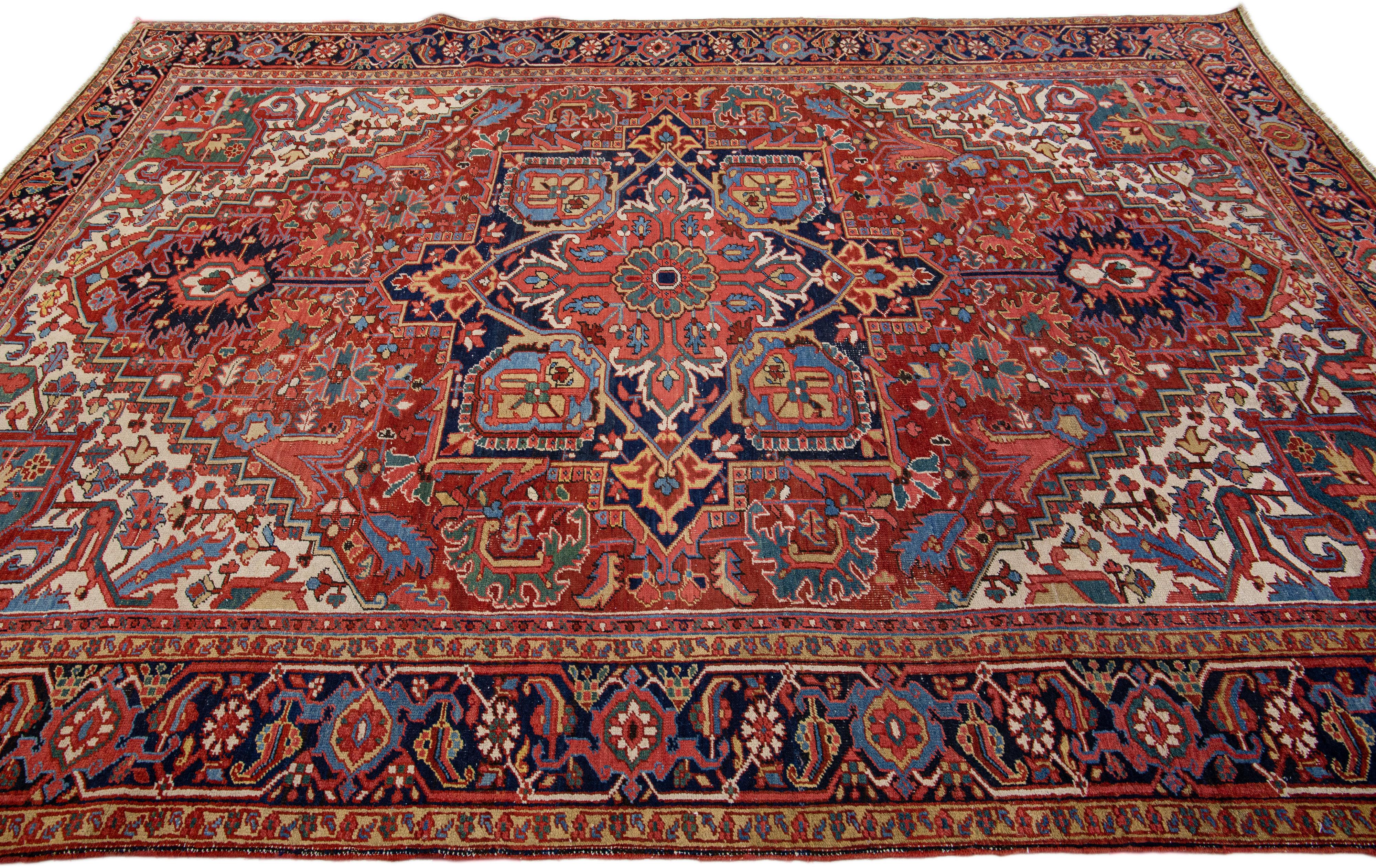 Antique Persian Heriz Red Handmade Wool Rug with Medallion Design In Good Condition For Sale In Norwalk, CT