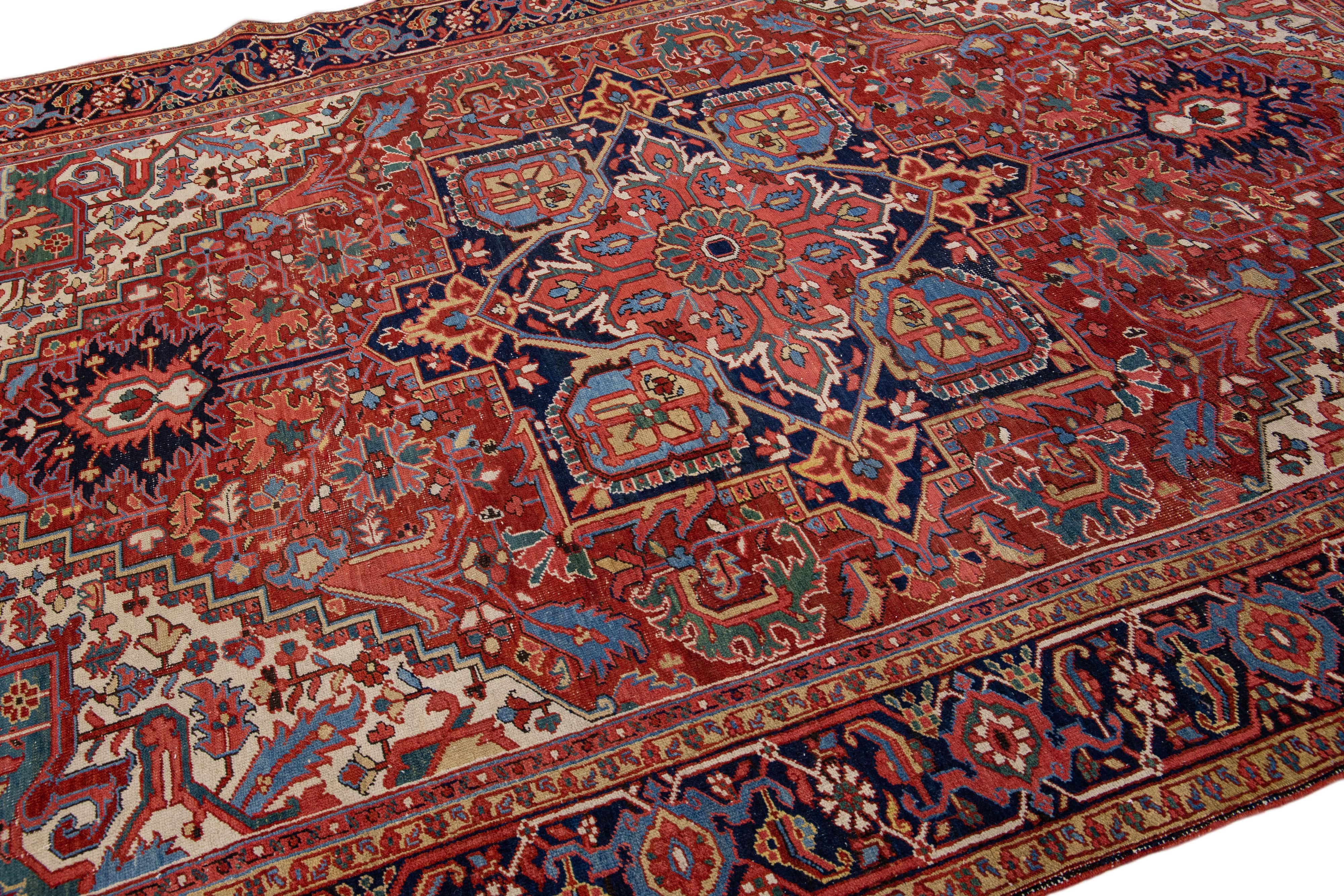 Antique Persian Heriz Red Handmade Wool Rug with Medallion Design For Sale 2
