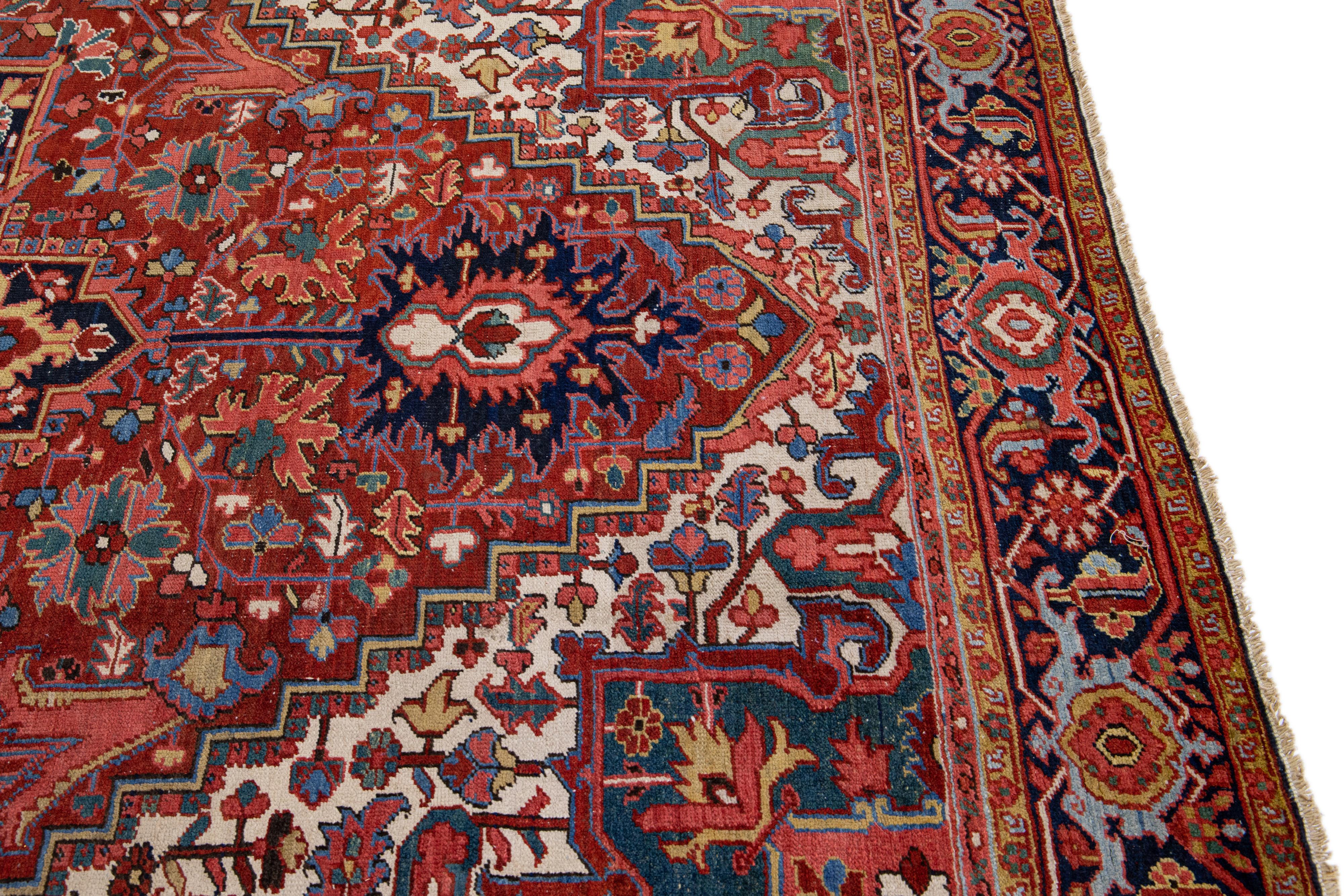 Antique Persian Heriz Red Handmade Wool Rug with Medallion Design For Sale 3