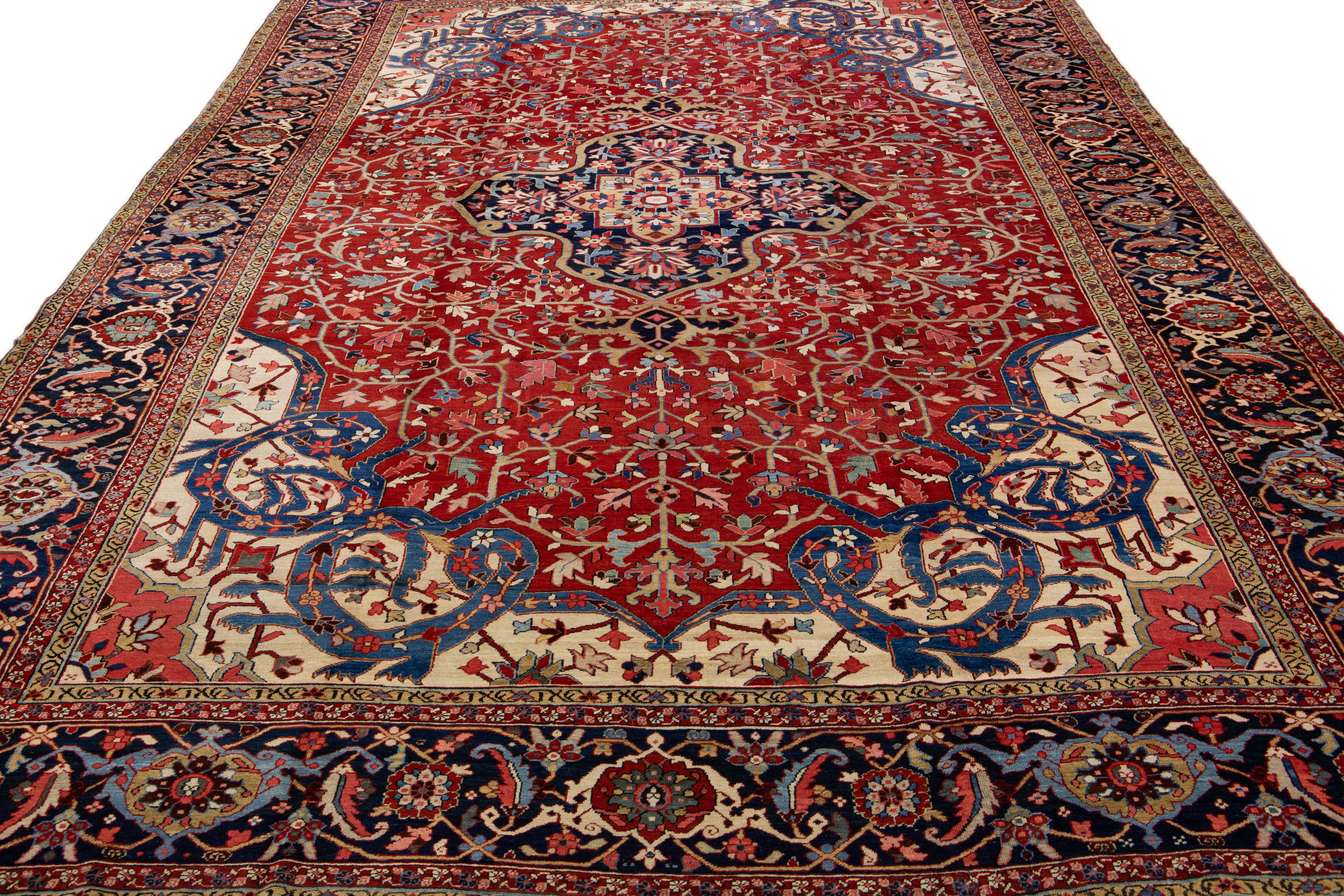 Heriz Serapi Antique Persian Heriz Red Handmade Wool Rug With Medallion Motif For Sale