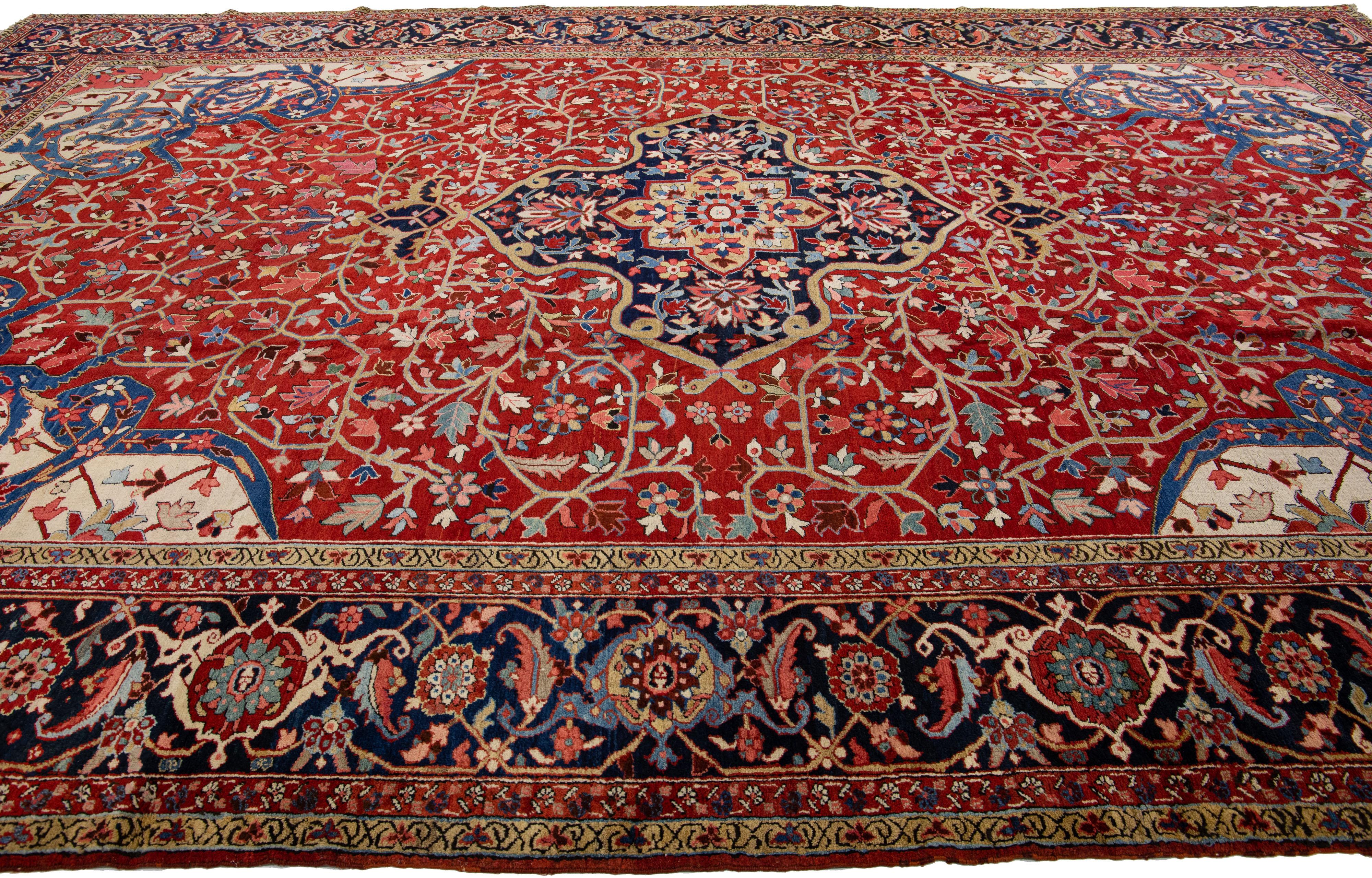 Hand-Knotted Antique Persian Heriz Red Handmade Wool Rug With Medallion Motif For Sale