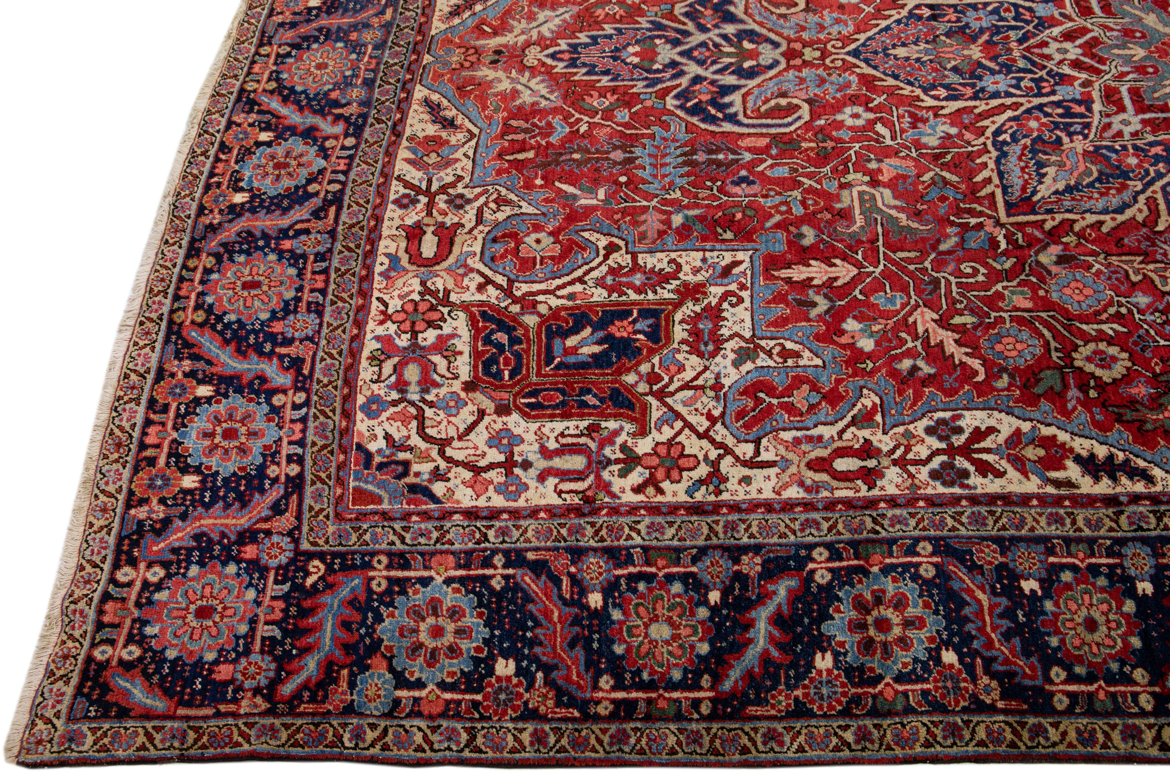 Hand-Knotted Antique Persian Heriz Red Handmade Wool Rug With Multicolor Medallion Motif For Sale
