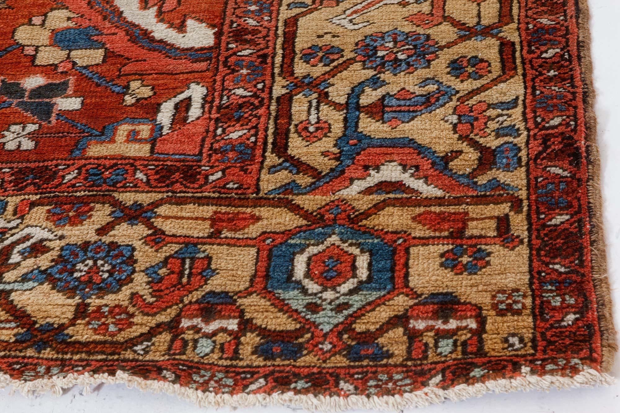 20th Century Antique Persian Heriz Red Wool Rug For Sale