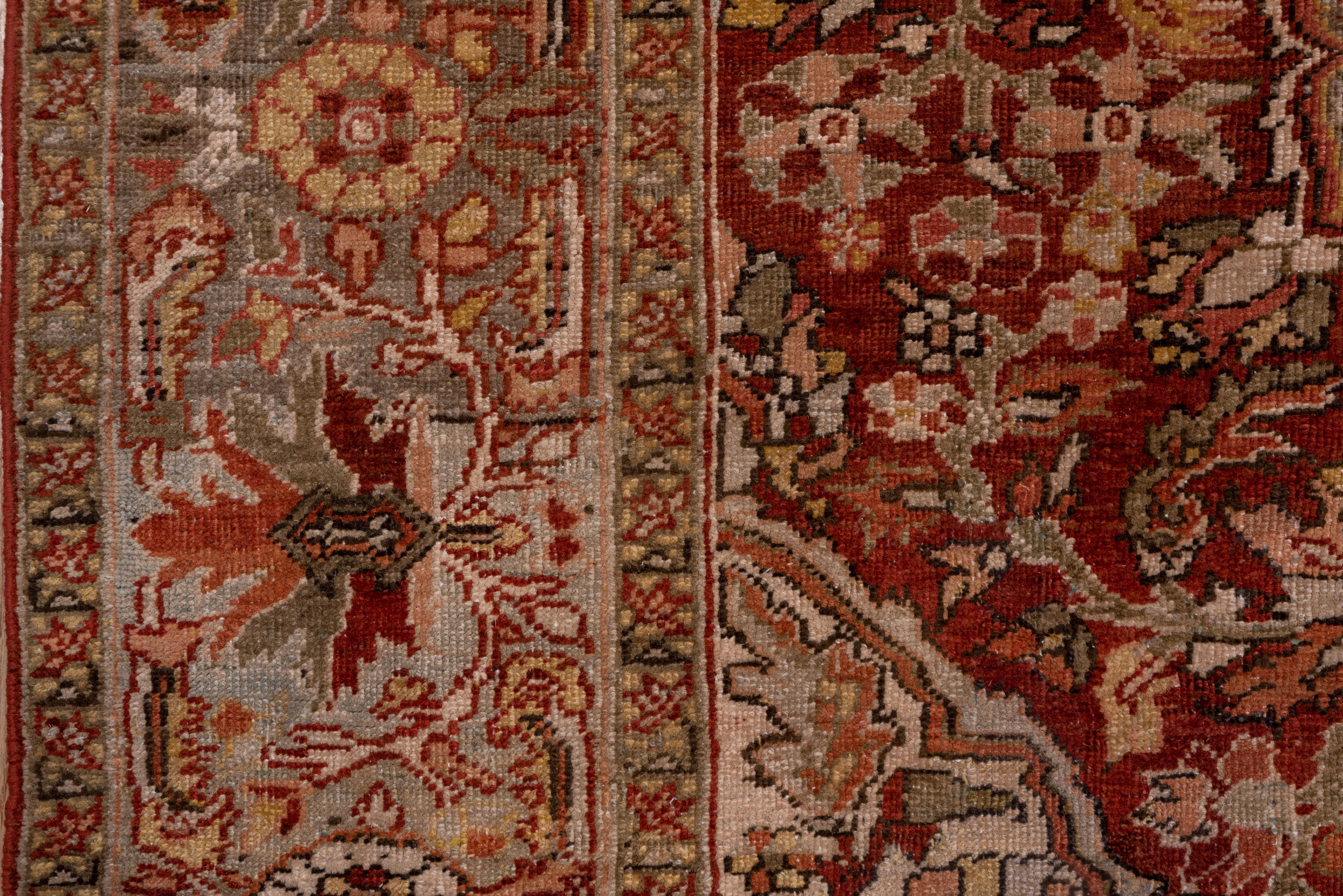 Wool Antique Persian Heriz Rug, Ahar Curvilinear Medallion, Warm Tones For Sale