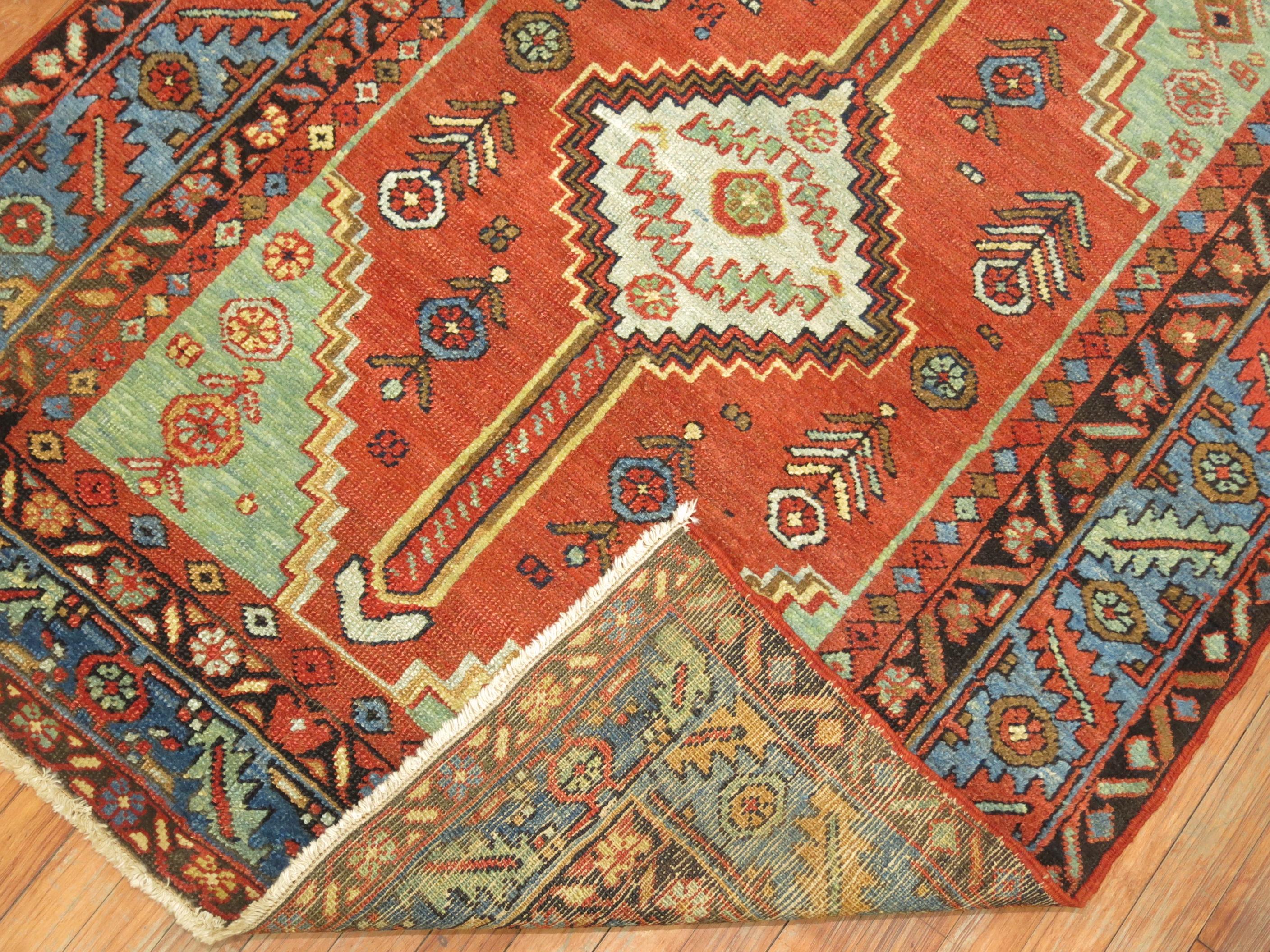 An antique Persian Heriz one of a kind Square Scatter rug.

4'1'' x 5'2''