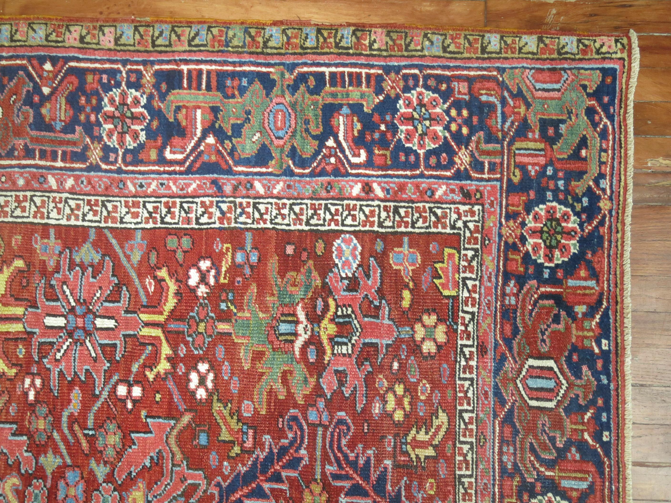 An early 20th century Persian Heriz room size colorful rug.

Measures: 7'4'' x 10'6''.