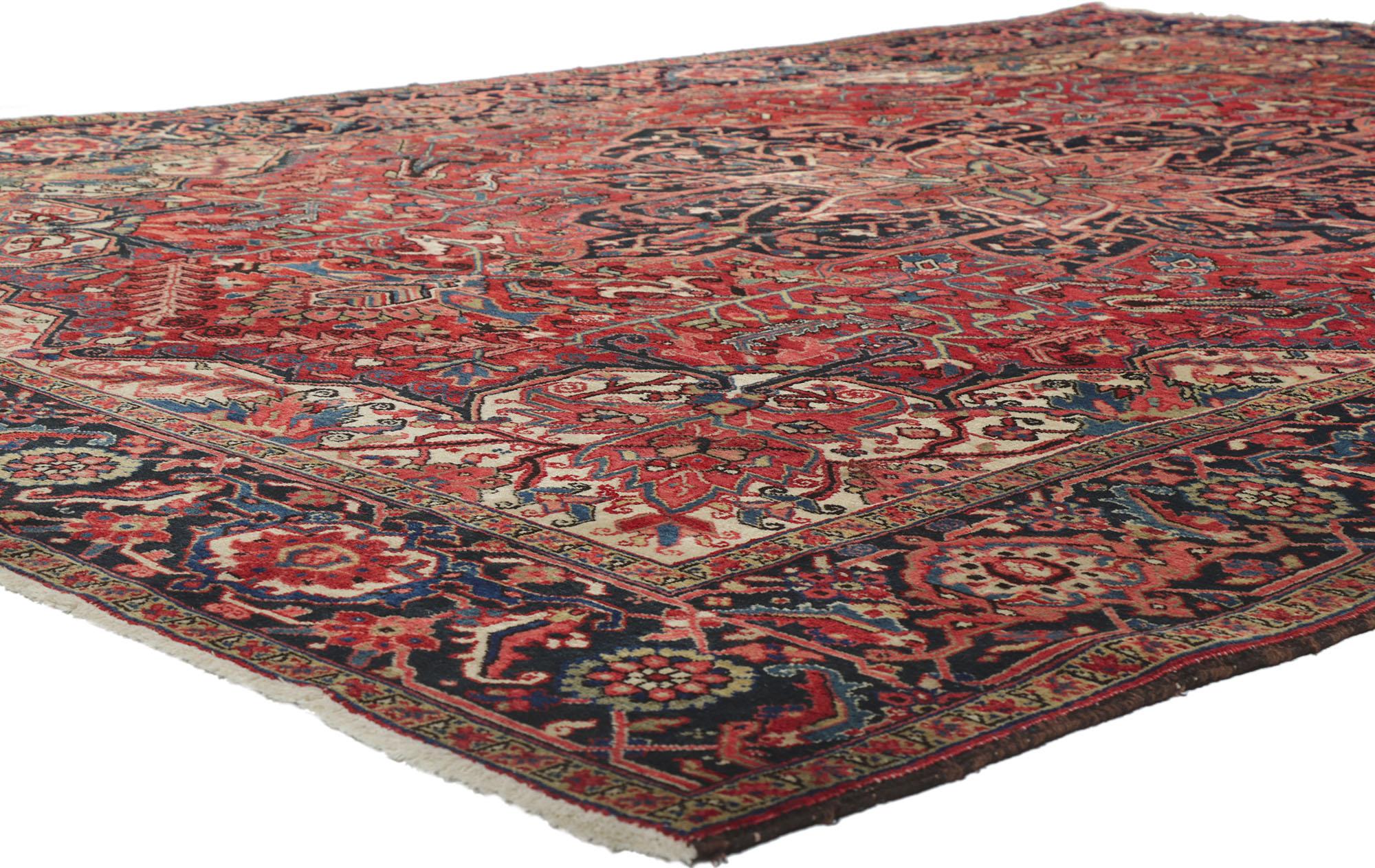 78222 antique Persian Heriz rug, measures: 08'08 x 12'00.
Rendered in variegated shades of red, navy blue, cerulean, tan, taupe, beige, sand, royal blue, pinkish-coral, and black coffee with other accent colors. Desirable Age Wear. Abrash.