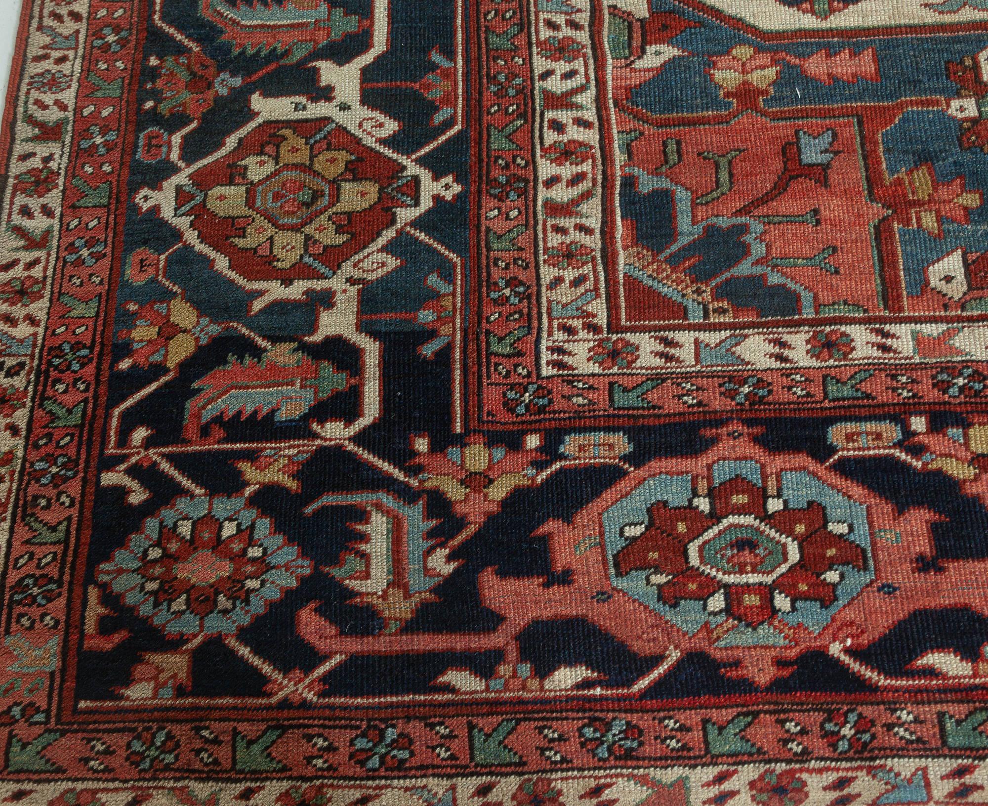 20th Century One-of-a-kind Antique Persian Heriz Rug in Beige, Blue, Pink, and Red