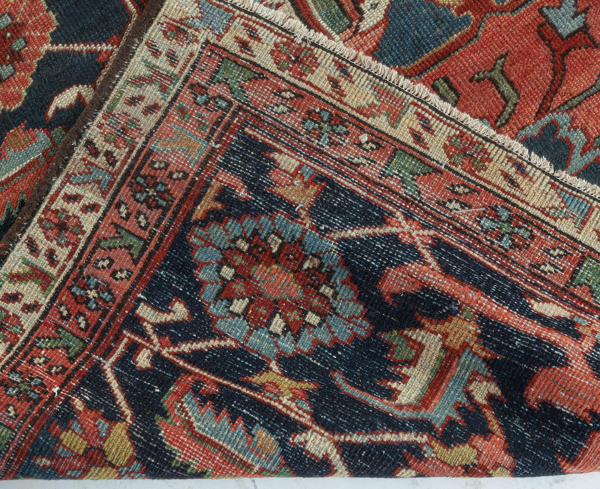 Wool One-of-a-kind Antique Persian Heriz Rug in Beige, Blue, Pink, and Red