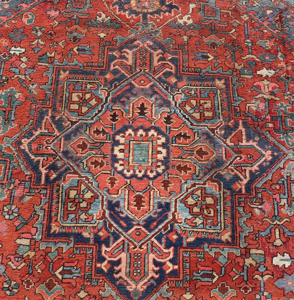Hand-Knotted Antique Persian Heriz Rug in Wool with Geometric Medallion Design in Jewel Tones For Sale