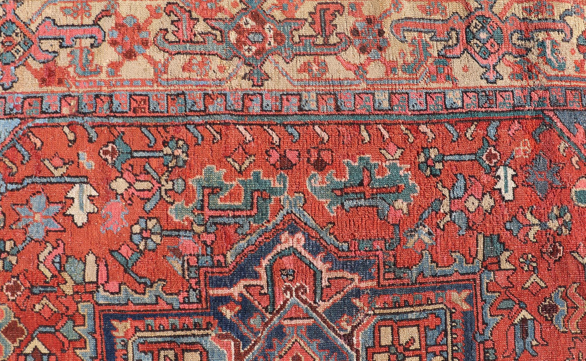 20th Century Antique Persian Heriz Rug in Wool with Geometric Medallion Design in Jewel Tones For Sale