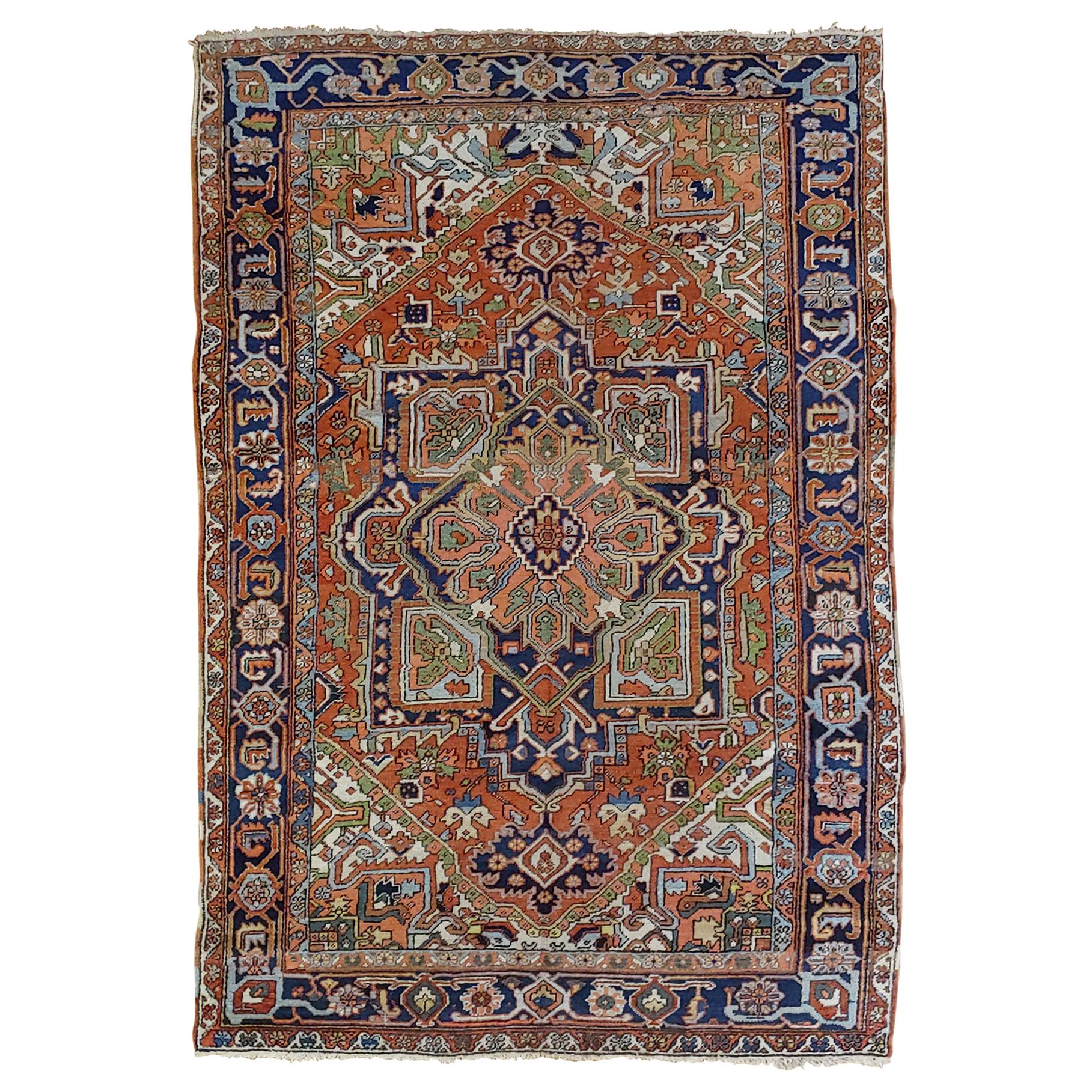 Antique Persian Heriz Rug, Rust Colored with Green and Navy, Wool, 1920 For Sale