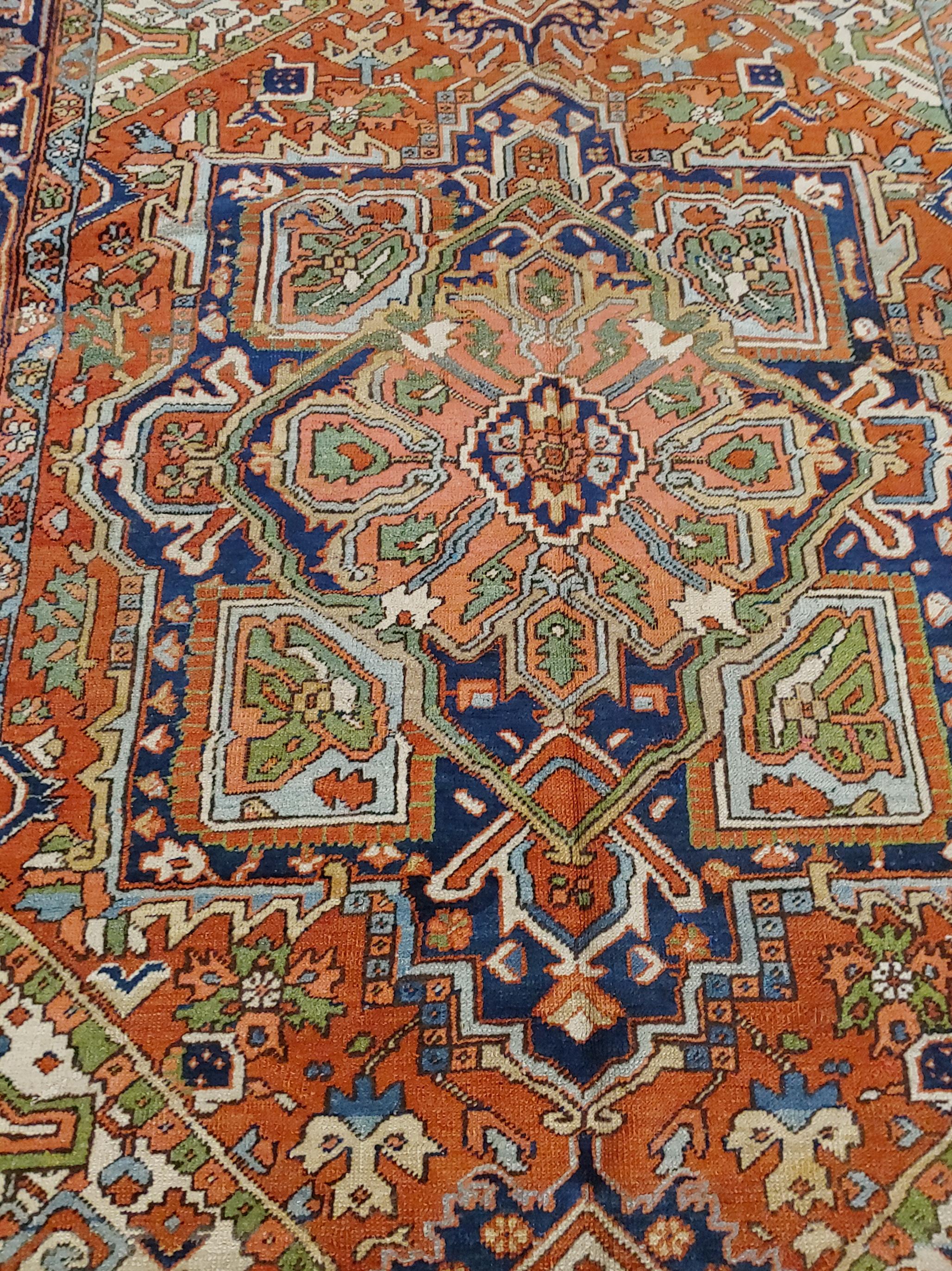 Heriz Serapi Antique Persian Heriz Rug, Rust Colored with Green and Navy, Wool, 1920 For Sale