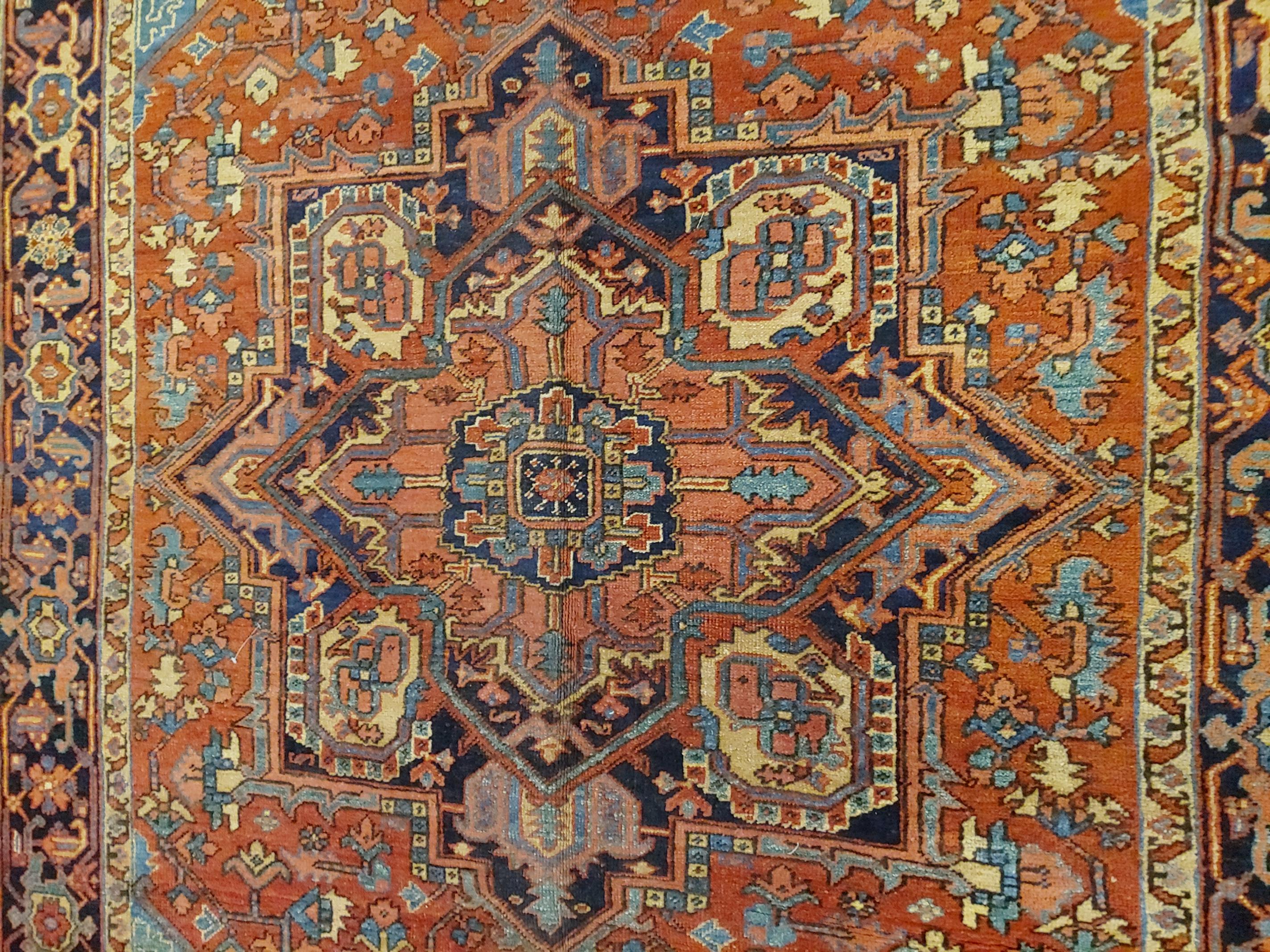 20th Century Antique Persian Heriz Rug, Rust With Light Blue Corners, Wool, 1915 For Sale