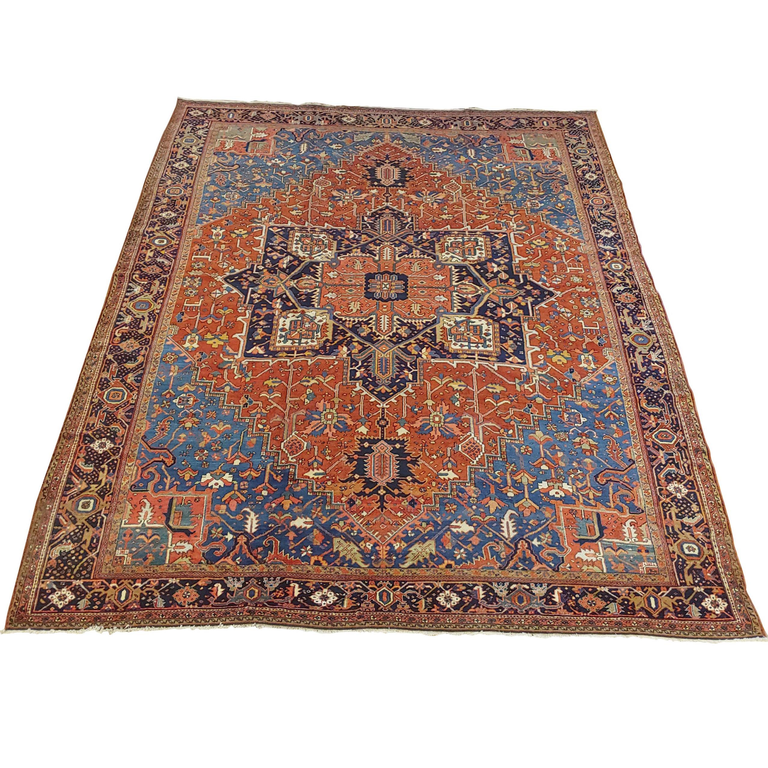 Antique Persian Heriz Rug, Rust with Blue and Teal Corners, Wool, 1915 For Sale