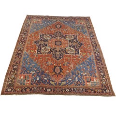 Antique Persian Heriz Rug, Rust with Blue and Teal Corners, Wool, 1915