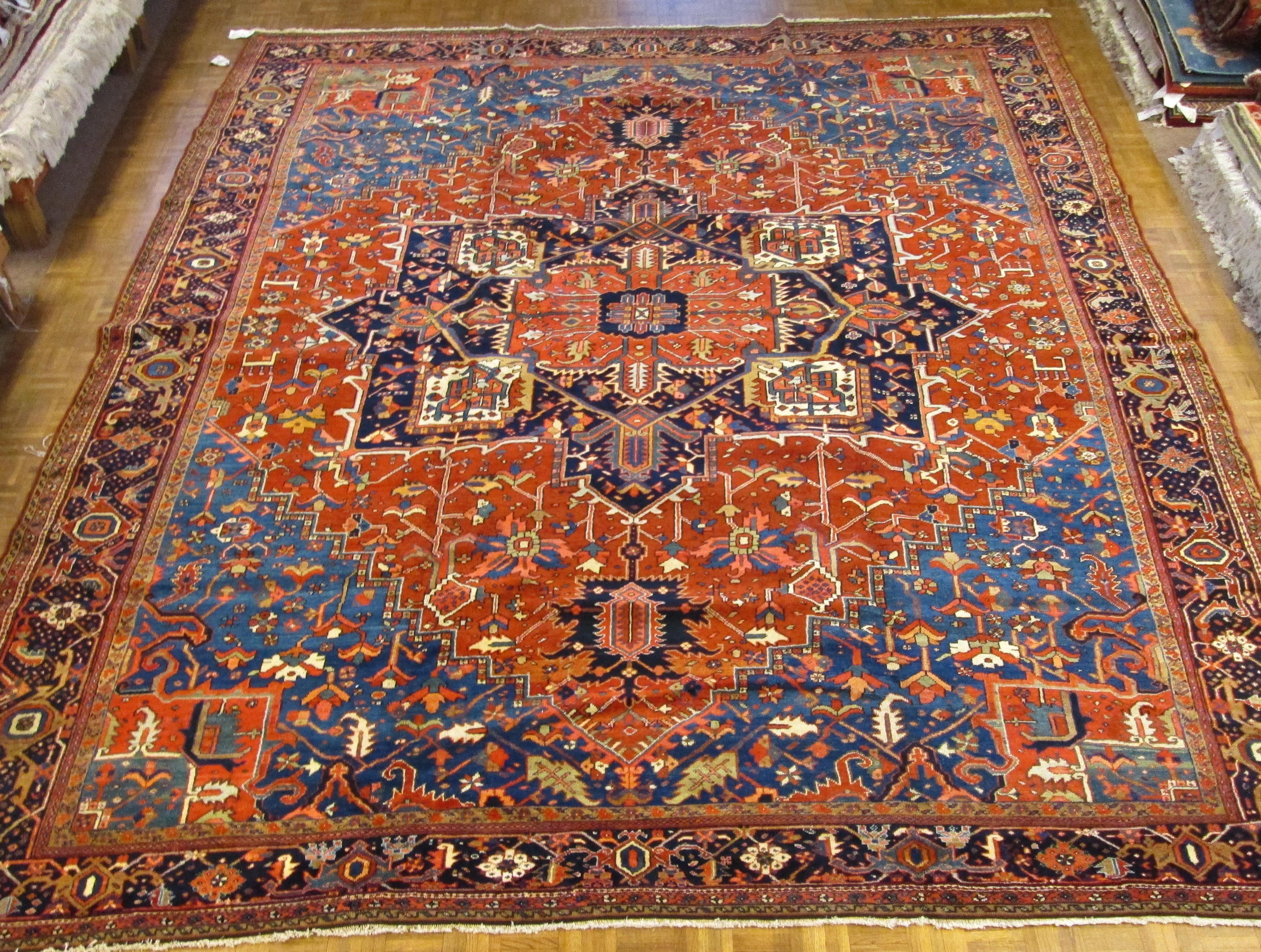 Antique Persian Heriz Rug, Rust with Blue and Teal Corners, Wool, 1915 For Sale 4