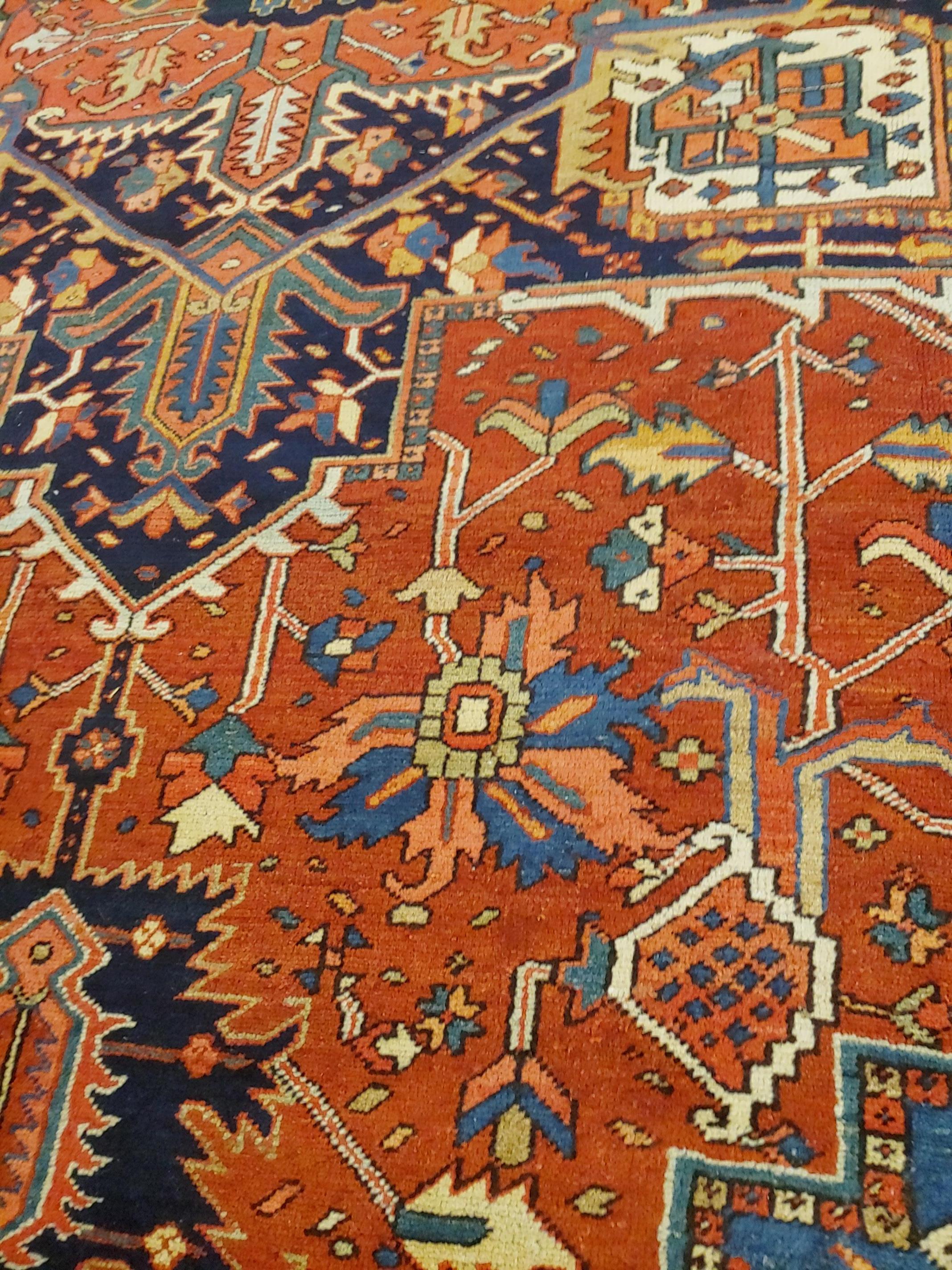 Antique Persian Heriz Rug, Rust with Blue and Teal Corners, Wool, 1915 For Sale 2